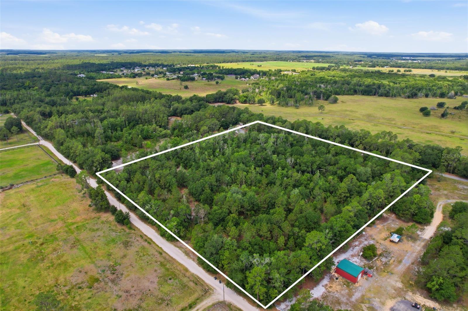 Discover the perfect opportunity to build your dream home on this  6.9-acre residential parcel nestled in a peaceful country setting. Located on a quiet paved road, this property offers privacy, tranquility, and endless possibilities with no HOA or deed restrictions. Conveniently situated just minutes from Hwy 27, you can enjoy the serenity of country living while still being close to shopping, dining, and everyday conveniences. Bring your vision and make this beautiful piece of land your own. Buyer to perform their own due diligence.