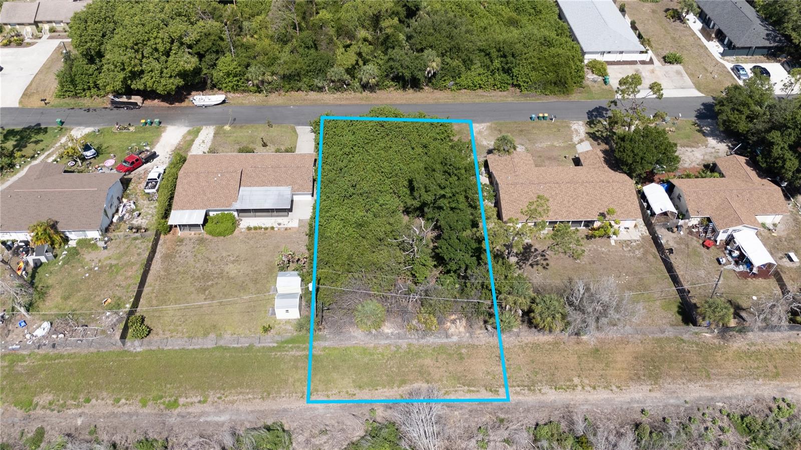 This is your opportunity to own a buildable lot in the heart of Englewood with public water and sewer available! Tucked away on a quiet street, this property offers added privacy with the road ending just steps from the pedestrian entrance to Oyster Creek Environmental Park, where you can enjoy miles of scenic walking trails, nature, and wildlife. Conveniently located near Englewood Beach, shopping, dining, golf courses, and everyday amenities, this is an ideal location to build your Florida dream home or invest in one of Englewood's desirable neighborhoods. Start planning your future today!