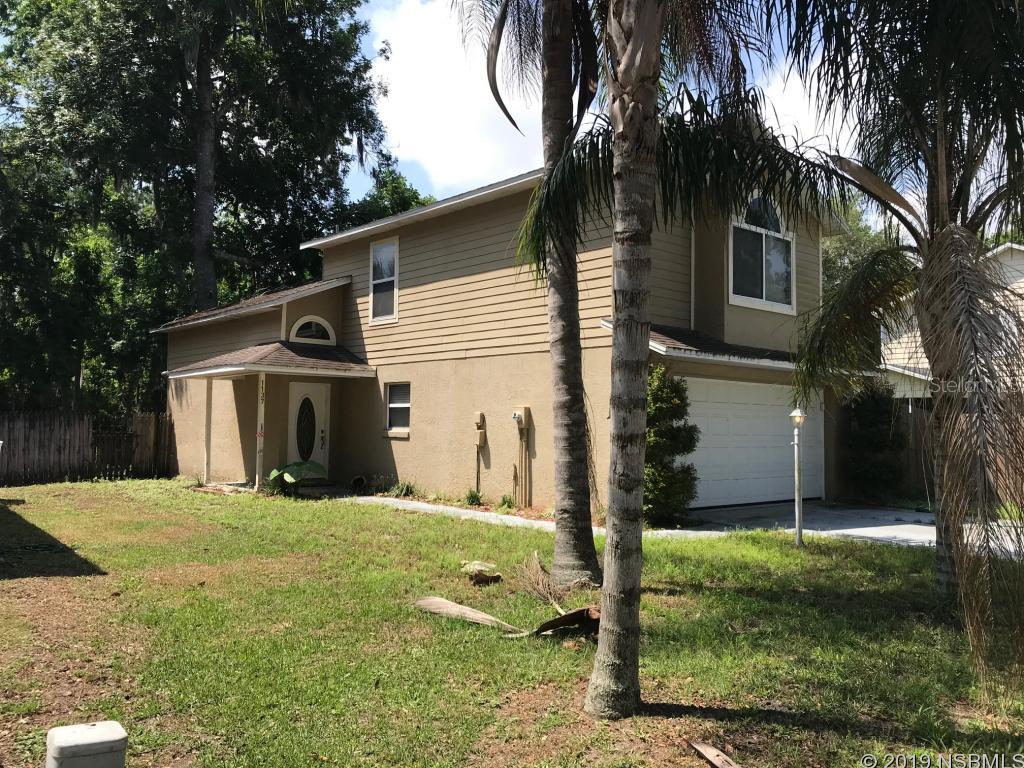 This beautiful 3 bedroom, 2.5 bath, 2 story home sits on a quite street close to all Port Orange has to offer. Downstairs the open kitchen has a breakfast bar and lots of counter space for cooking. There are vaulted ceilings and wood flooring. The bedrooms are ample sized, with wood flooring and big windows. Available May 1st, Pets considered with additional pet fee.A background screening, first months rent and security deposit required. Appointment required