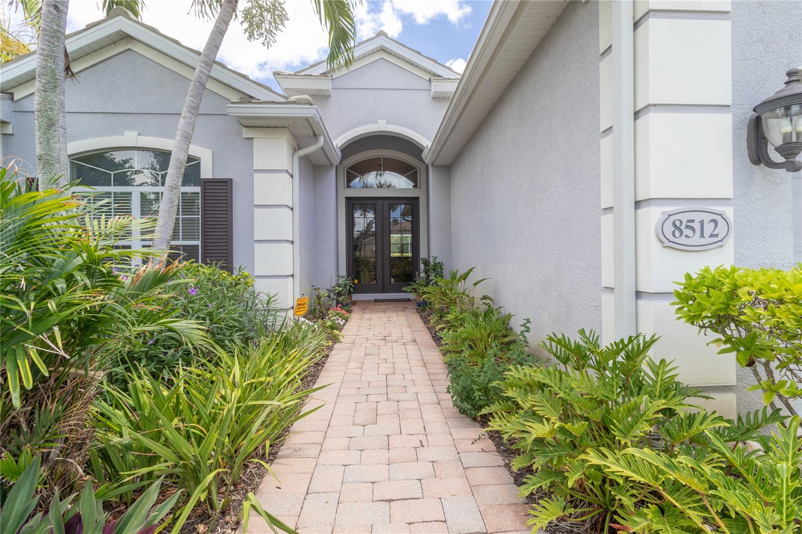 LUXURY HOME IN WISTERIA PARK - NORTHWEST BREADENTON
Experience exceptional Florida living in this stunning 3-bedroom + office, 2.5-bath Chesapeake Collection model by Neal Communities, located in the highly sought-after Wisteria Park community of Northwest Bradenton. Designed for both elegance and entertaining, this beautifully upgraded home features soaring 12-foot ceilings, crown molding, an open-concept floor plan, and abundant natural light. The gourmet chef's kitchen boasts Cambria quartz countertops, premium maple cabinetry, stainless steel appliances, a wine cooler, and a butler's pantry. The spacious owner's suite offers a luxurious bath with double sinks, seperate large tub and luxious shower. The private office provides the perfect work-from-home space. Step outside to your own tropical retreat featuring a heated screened saltwater pool with a waterfall, expansive lanai, and outside pool bathroom—ideal for relaxing or entertaining year-round. Additional highlights include a tile roof, paver driveway, natural gas, reclaimed irrigation, and numerous designer upgrades throughout. Wisteria residents enjoy resort-style amenities including a community pool, spa, outdoor kitchen, playground, gazebo, and scenic pond. The HOA also includes lawn maintenance, cable TV, and high-speed internet for truly maintenance-free living.
Perfectly located just minutes from Robinson Preserve, De Soto National Memorial, Palma Sola Botanical Park, IMG Academy, Bradenton Country Club, Downtown Bradenton, Lakewood Ranch, Sarasota-Bradenton International Airport, and the sugar-sand beaches of Anna Maria Island. This exceptional home offers luxury, convenience, and the Florida lifestyle you've been waiting for. Schedule your private showing today!