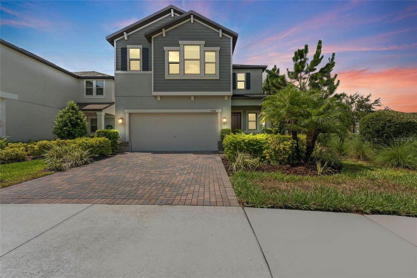 Absolutely stunning 4 BR + LOFT /2.5 BA/ 2 Car Garage home in the highly sought-after Bexley community of Land O’ Lakes! This beautifully designed offers modern living with upscale finishes throughout. Step inside to find a bright, open floor plan filled with natural light, highlighted by designer ceramic tile floors that span the entire downstairs. The gourmet kitchen is the heart of the home, featuring solid white cabinetry, gleaming white quartz countertops, a large kitchen island, stainless steel appliances with a gas stove, recessed lighting, and a generous walk-in pantry—perfect for both everyday living and entertaining. Upstairs, brand-new carpeting adds comfort to the bedrooms and loft area, while ceiling fans throughout the home ensure year-round comfort. The expansive master suite includes an oversized walk-in closet and a luxurious ensuite bathroom with a soaking tub, walk-in shower, and dual vanities. Enjoy the curb appeal of a brick paver driveway and walkway, along with access to all the top-tier amenities that Bexley has to offer—including two resort-style pools, a state-of-the-art fitness center, open-air game room, multiple playgrounds and parks, soccer fields, splash zone, dog park, and miles of scenic trails with fitness stations. Conveniently located near top-rated schools, medical facilities, premier shopping and dining, and with easy access to the Suncoast Parkway for a quick commute to Tampa, this home truly has it all. Don’t miss your opportunity to live in one of Land O’ Lakes’ most vibrant and amenity-rich communities! Our application process is quick and easy, apply today!