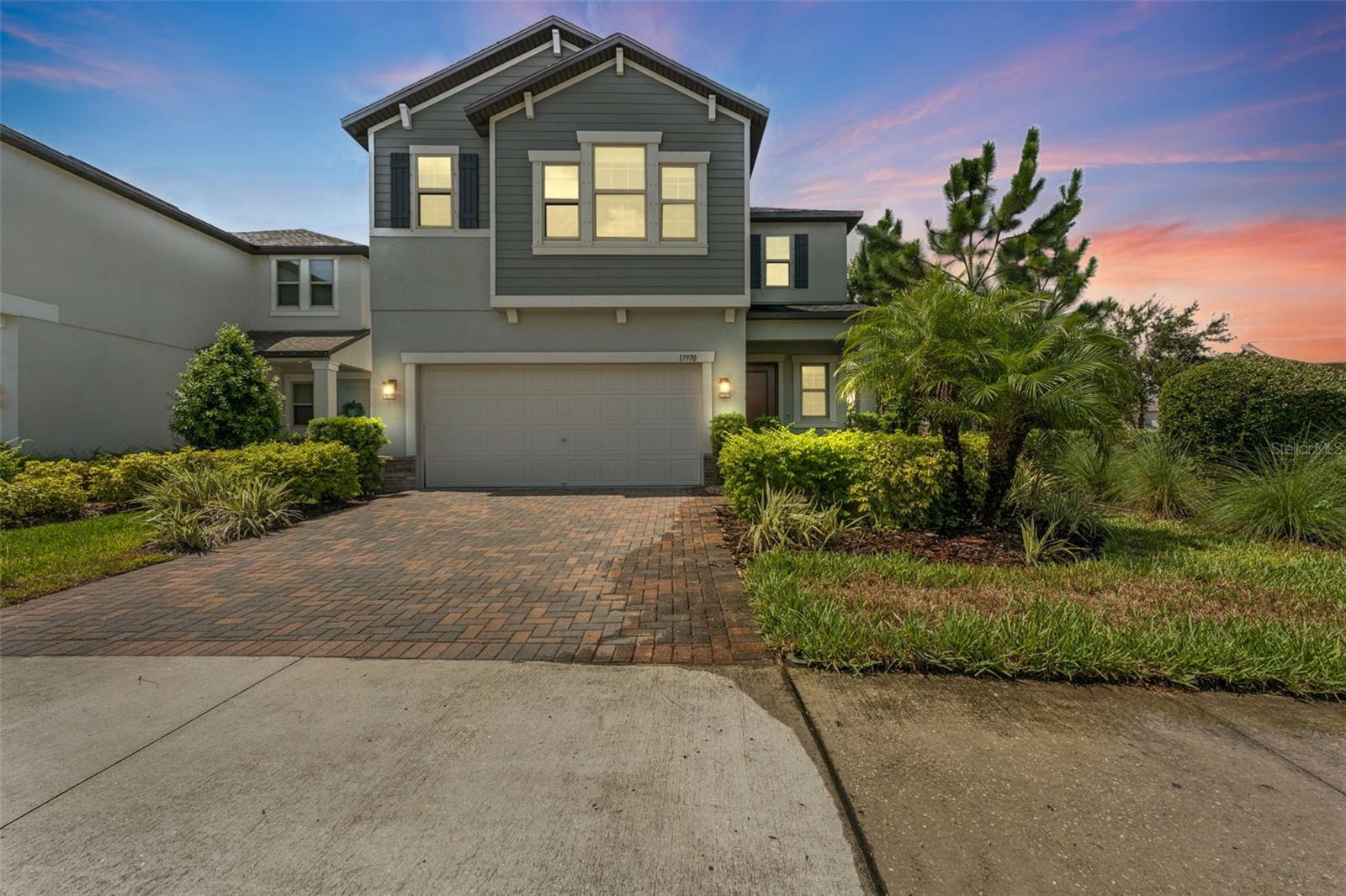 Absolutely stunning 4 BR + LOFT /2.5 BA/ 2 Car Garage home in the highly sought-after Bexley community of Land O’ Lakes! This beautifully designed offers modern living with upscale finishes throughout. Step inside to find a bright, open floor plan filled with natural light, highlighted by designer ceramic tile floors that span the entire downstairs. The gourmet kitchen is the heart of the home, featuring solid white cabinetry, gleaming white quartz countertops, a large kitchen island, stainless steel appliances with a gas stove, recessed lighting, and a generous walk-in pantry—perfect for both everyday living and entertaining. Upstairs, brand-new carpeting adds comfort to the bedrooms and loft area, while ceiling fans throughout the home ensure year-round comfort. The expansive master suite includes an oversized walk-in closet and a luxurious ensuite bathroom with a soaking tub, walk-in shower, and dual vanities. Enjoy the curb appeal of a brick paver driveway and walkway, along with access to all the top-tier amenities that Bexley has to offer—including two resort-style pools, a state-of-the-art fitness center, open-air game room, multiple playgrounds and parks, soccer fields, splash zone, dog park, and miles of scenic trails with fitness stations. Conveniently located near top-rated schools, medical facilities, premier shopping and dining, and with easy access to the Suncoast Parkway for a quick commute to Tampa, this home truly has it all. Don’t miss your opportunity to live in one of Land O’ Lakes’ most vibrant and amenity-rich communities! Our application process is quick and easy, apply today!
