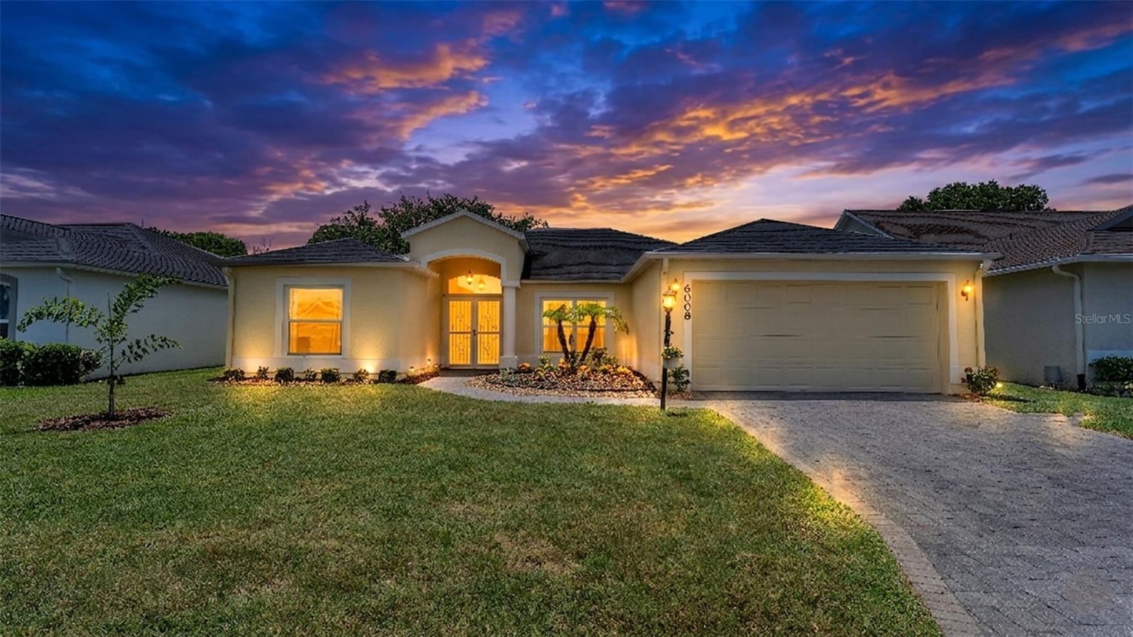 GOLF COURSE BEAUTY OVERLOOKING THE 8TH TEE BOX! Enjoy breathtaking golf course views and effortless Florida living in this beautifully updated and meticulously maintained 3-bedroom, 2-bath home located in the highly sought-after 55+ community of Sandpiper Golf & Country Club.
From the moment you arrive, you'll appreciate the inviting double front doors, attractive curb appeal, and the convenience of nearly step-free access from both the front entrance and garage, with only an approximate 2-inch elevation change, making everyday mobility easier.
Inside, the bright and spacious floor plan is filled with natural light and showcases beautiful views of the 8th tee box. The home features a formal dining room, spacious living room, and a well-appointed kitchen with breakfast bar and casual dining area, creating the perfect layout for both entertaining and everyday living.
Recent updates make this home truly move-in ready, including new luxury vinyl and carpet flooring, granite countertops in the kitchen and both bathrooms, new sinks, faucets, and toilets, a new stainless-steel range and microwave (never used), plus a newer stainless-steel refrigerator and dishwasher. The washer and dryer also convey with the sale.
The desirable split-bedroom floor plan provides privacy for both owners and guests. The spacious primary suite features two closets, including a walk-in closet, dual vanities, a relaxing garden tub, and a separate shower. Guest bedrooms are generously sized and conveniently located near the second bath.
One of the home's standout features is the approximately 225-square-foot Florida room, which is not included in the home's base living square footage. Enclosed with acrylic slider windows and offering panoramic views of the 8th tee box, this versatile space is ideal for morning coffee, entertaining guests, hobbies, or simply relaxing while enjoying the peaceful golf course setting. Four pocket sliding glass doors open seamlessly to the Florida room, creating an exceptional indoor-outdoor living experience.
Additional features include protective hurricane-rated screens installed along the rear and one side of the home, providing protection from stray golf balls while also offering storm protection, added security, and peace of mind. Other highlights include multiple ceiling fans, in-wall pest control tubing, an inside laundry room, a conveniently located community mailbox at the end of the driveway, and an oversized two-car garage with pull-down attic access and additional storage
The roof was replaced in 2017, providing added peace of mind. Low monthly HOA fees include lawn care, cable, internet, clubhouse access, community pools, fitness center, sauna, billiards, cornhole, tennis and pickleball courts, RV/Boat Storage area, restaurant, golf, and an active social calendar. Conveniently located near shopping, dining, medical facilities, and I-4.
This exceptional golf course home combines comfort, accessibility, thoughtful updates, and resort-style amenities in one of Lakeland's most desirable active adult communities. Schedule your private showing today!