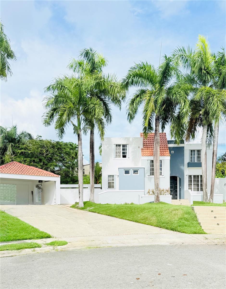 Property located in the exclusive Paisaje del Lago community in Luquillo, PR 00773 on a cul de sac street. This elegant two-level home features 4 spacious bedrooms, 2 full bathrooms, and 2 half baths on a 1465.67sq ft lot. Recently remodeled  kitchen and spacious terrace with private pool. The property is fully fenced, water cisten, storm shutters, roof treatment (last done 2 years ago),  4 air conditioning units, and an electric transfer switch for a generator. HOA is $170.00 monthly. Listed for $725,000, this coastal gem offers the perfect blend of luxury, comfort, and sustainability. Paisaje del Lago is a closed community with 24 hours security, playground, ½ tennis court, ½ basketball court and administration office. Located on Road #3 minutes from Luquillo Beach, Kioskos and 35 minutes from the airport.  Paisaje del Lago is 2 minutes from Luquillo Beach and La Pared.