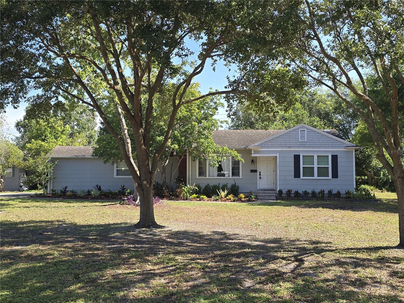 Welcome home to this beautifully updated Craftsman nestled in the heart of Tampa's beloved Wellswood neighborhood. Blending timeless character with modern updates, this inviting 3-bedroom, 2-bath residence offers the warmth and charm that make classic homes so desirable, while providing the comforts today's renters appreciate.

Step inside to discover a spacious living room centered around a beautiful fireplace, creating the perfect gathering space for relaxing evenings or entertaining guests. The updated kitchen features modern finishes and ample cabinetry, while both renovated bathrooms offer a fresh, contemporary feel.

Enjoy Florida living year-round from the screened rear porch, an ideal spot for morning coffee or unwinding after a long day. A large detached storage shed provides plenty of room for tools, bicycles, seasonal décor, or outdoor equipment.

Located in the heart of Wellswood, you'll quickly understand why so many residents fall in love with this charming, tree-lined community. Rich with character and a true neighborhood atmosphere, Wellswood offers a rare blend of quiet residential living while being just minutes from Downtown Tampa, Midtown, Tampa International Airport, Raymond James Stadium, the Riverwalk, major hospitals, shopping, dining, and everything the city has to offer. It's a neighborhood where neighbors know one another, mature oak trees shade the streets, and convenience meets community.

If you've been searching for a home with authentic character, thoughtful updates, abundant storage, and an unbeatable central location, this Wellswood gem is one you won't want to miss.