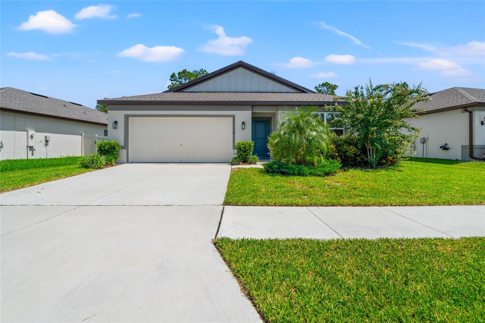 Priced for a quick sell! Welcome home to this beautiful move in ready one story home, built in 2021, offering 4 bedrooms, 2 bathrooms, and a peaceful conservation view. Conveniently located just a short walk from schools and only minutes from I-75, it combines comfort with an excellent location. Inside, you'll find a spacious split bedroom floor plan with no carpet, featuring tile and laminate flooring throughout. The open concept kitchen is perfect for everyday living and entertaining, offering a large island, granite countertops, wood cabinetry, a spacious pantry, and all appliances included. A separate laundry room adds even more convenience. Relax knowing you're in a gated community with fantastic amenities, including a clubhouse, resort-style pool, playground, and dog park.