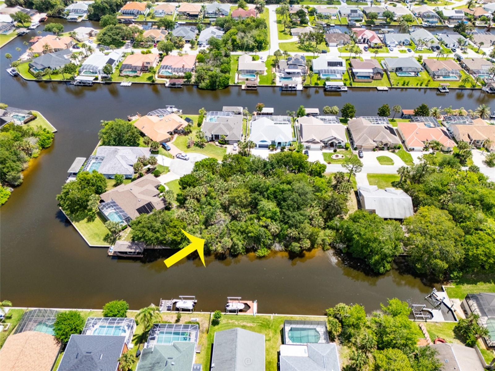 Beautiful saltwater canal lot located in the "C" section of Palm Coast, Palm Harbor neighborhood. No required build time, offering the flexibility to build when you’re ready. Imagine watching the dolphin play and the manatee roll on by, or catch tonight's dinner off of your own private dock! Prime location, one block from the main canal for easy boating access. Conveniently located near shopping, dining, and medical facilities.