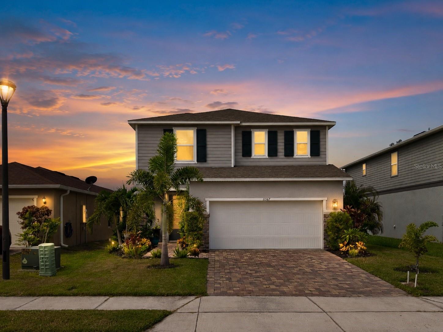 Your own tropical backyard oasis awaits! This beautifully maintained 2022 KB Home featuring 3 bedrooms, 2.5 bathrooms, and over 2,200 sq ft of living space offers the perfect blend of modern upgrades, thoughtful design, and Florida outdoor living. From the peaceful pond views to the lush landscaping, extended paver walkway, covered lanai, and cozy outdoor fire pit area, this backyard was designed to relax, entertain, and enjoy year round.
Inside, pride of ownership shines throughout with a bright open floor plan, upgraded lighting fixtures, and stylish finishes around every corner. The kitchen is truly the heart of the home featuring stainless steel appliances, upgraded backsplash, a spacious island perfect for gathering, and custom pantry shelving providing additional storage and organization.
Upstairs you’ll find spacious bedrooms along with a versatile flex space featuring beautiful custom barn doors, giving you endless options for a home office, playroom, media room, guest space, or private retreat.
Perfectly positioned within the community, enjoy resort-style amenities with the playground, soccer fields, and outdoor recreation just a stone’s throw away. With the upgrades, landscaping, and finishing touches already completed, this move-in ready home gives you the feel of new construction without the wait.
Come experience the pond views, outdoor living, and thoughtful details that make this home truly stand out!