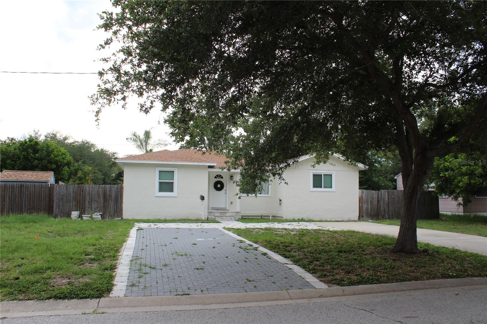 6014 Cedar St. NE offers an excellent Northeast St. Petersburg location with convenient access to downtown, top-rated schools, shopping, dining, and recreation. This 4-bedroom, 2-bathroom home offers a functional layout with a spacious primary suite featuring a private bathroom and walk-in closet. Step outside to enjoy the covered back porch, complete with ceiling fans, pavers, and updated lighting perfect for relaxing or entertaining. The backyard is fully enclosed with a wooden fence, providing added privacy and space to enjoy the outdoors. 

The new Speer YMCA, Mangrove Bay and Cypress Links Golf Courses, Publix, Whole Foods, and the 4th Street corridor are all just minutes away, providing easy access to some of the area's most popular amenities. The property is also near highly regarded schools, the new Speer YMCA, and the popular Mangrove Bay and Cypress Links Golf Courses. Everyday shopping is a breeze with Publix, Whole Foods, and numerous retail and dining options just a short drive away along the 4th Street corridor. Whether you're commuting, spending the day on the golf course, or exploring everything downtown St. Pete has to offer, this location provides the perfect balance of convenience, recreation, and neighborhood charm.
