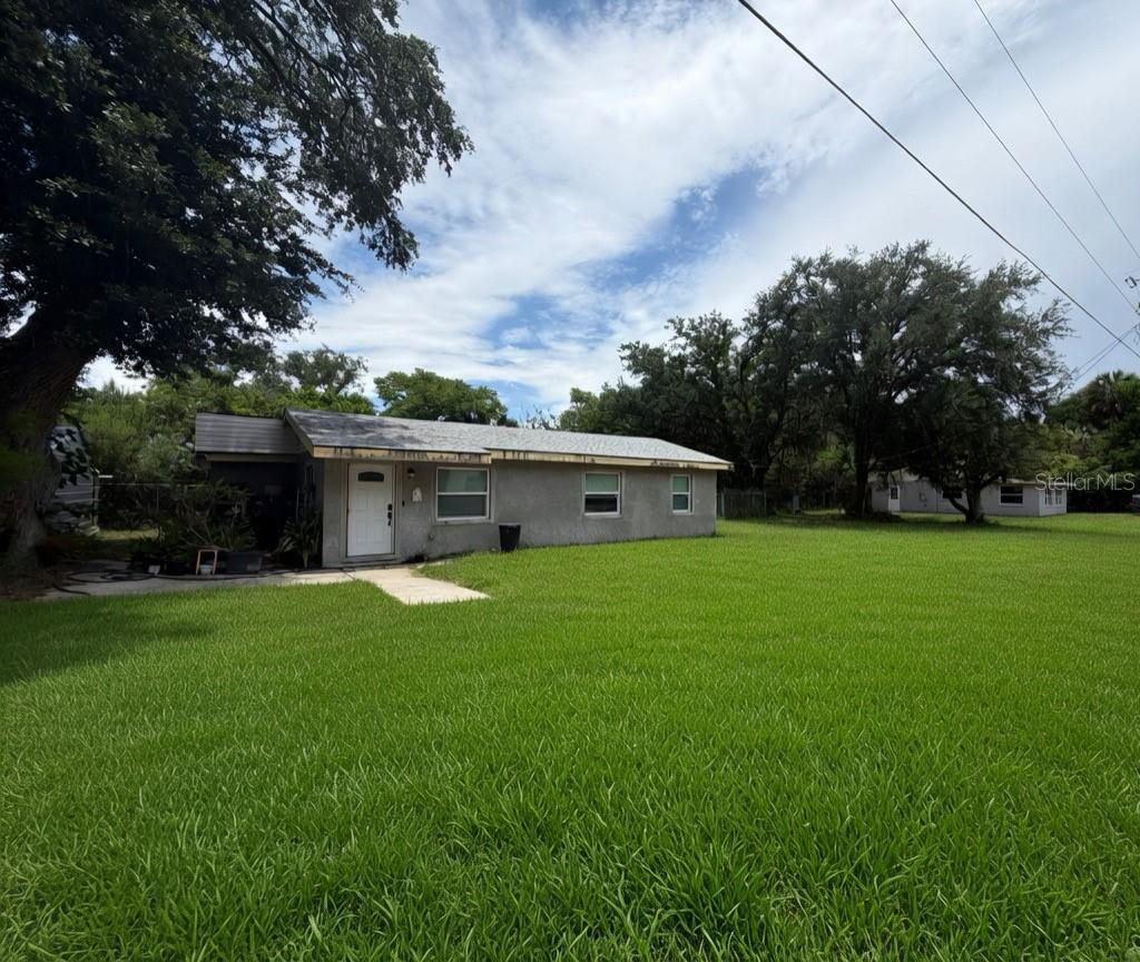 Exceptional opportunity to own a double commercial lot in the heart of Sanford, Florida! Located at 3316 W 5th Street, this versatile property features a completely renovated structure currently in progress, offering the perfect canvas for investors, entrepreneurs, or business owners looking to customize their space from the ground up. The existing structure has undergone extensive renovations and can easily be converted into a professional office building, medical suite, law office, or a variety of other commercial uses — making it an ideal investment for end-users and developers alike. Strategically positioned with immediate access to SR 46, quick connectivity to Interstate 4, and just minutes from the thriving Historic Downtown Sanford corridor, this property sits in a high-visibility, high-traffic area poised for growth. Enjoy the benefits of proximity to established retail, dining, professional services, and the continued commercial expansion throughout the Sanford market. Whether you're looking to complete the renovation to your own specifications, establish a business headquarters, or add a income-producing commercial asset to your portfolio, this double lot delivers size, location, and flexibility that is rarely found at this price point. Don't miss this unique chance to secure a foothold in one of Central Florida's fastest-growing commercial corridors. Schedule your showing today!