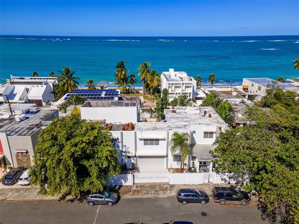 Once you step foot into this sprawling urban estate, you leave the noise and chaos of the city behind.  Located on a quiet, gorgeous, flowering tree-lined street, you're truly away from it all and yet still just a few steps from the beach.  Possibly the largest home in the Condado area, this exclusive residence lays out openly and has been recently completely remodeled, though there are a few details yet to complete: one of the master bathrooms, and the roof terrace area that features ocean views.  This is a special home that can easily host hundreds of people for an event, with a massive gym that can be converted to a wonderful TV lounge/movie room area or can be a third master suite.

Priced to sell and comes fully furnished.  Call for a showing today!