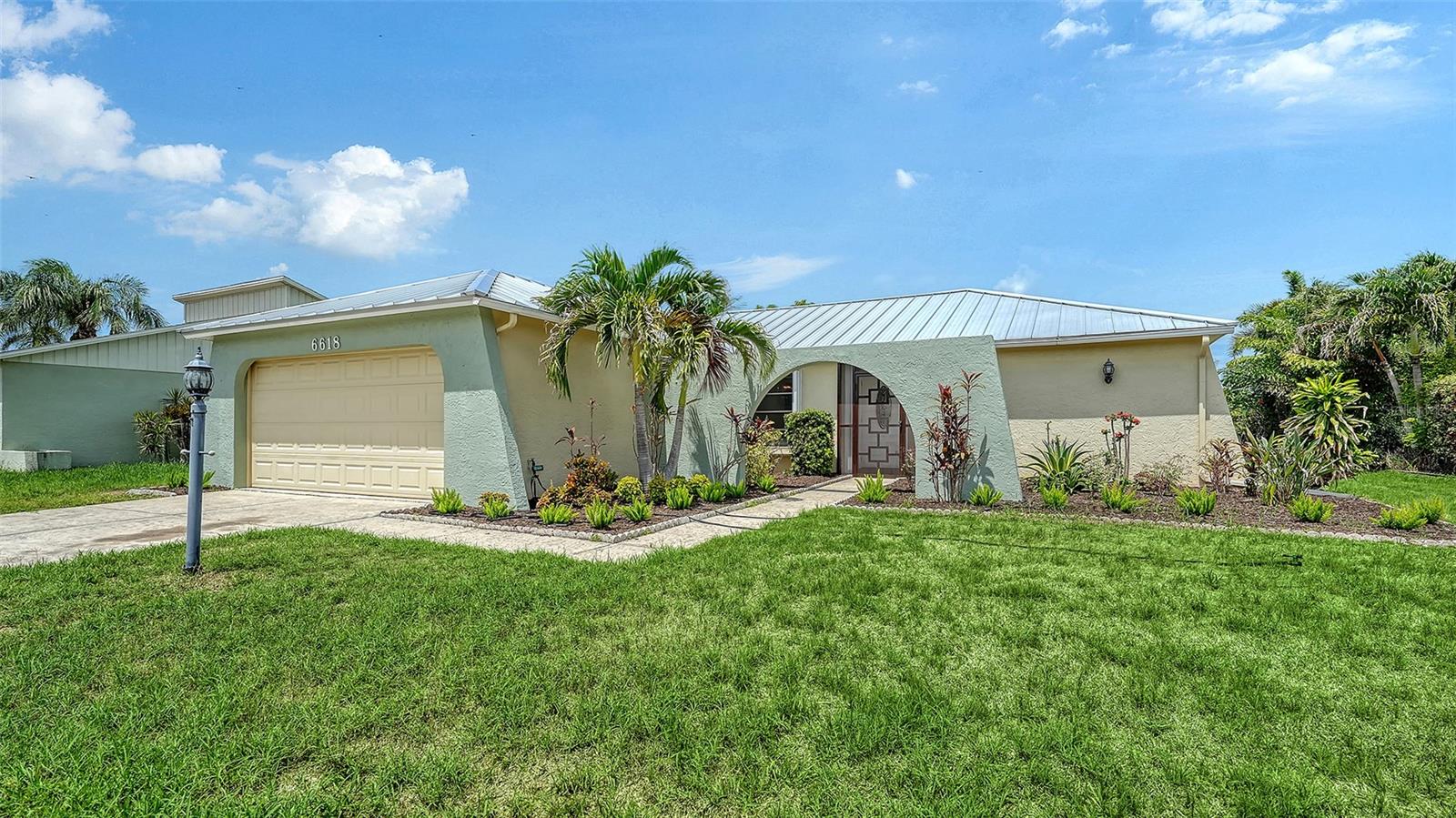 The best of everything – convenient location, desirable neighborhood, new roof, split plan, updated kitchen, interior laundry room, 2 car garage, new floors, hurricane protection, covered lanai and sparkling pool.  This sweet home is versatile and functional - regardless of your desired use - full time residence, or lock and leave seasonal use, this is the spot to relax, unwind, and enjoy living the Florida lifestyle – Sarasota style. Siesta Key beach, nearest access is only 3.5 miles from your door.  Downtown Sarasota offers a multitude of cultural events, waterfront outings, and social opportunities - including The Bay, Marina Jacks, Selby Gardens, Sarasota Opera, Van Wezel Performing Arts Center, Ringling School of Art and Design, and the Ringling Museum. World renowned, and locally embraced - this is the town to become a part of today!