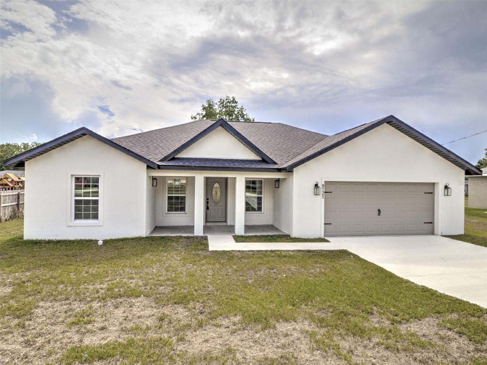Welcome Home to this beautiful and spacious 3-bedroom, 2-bathroom newly construction home. Step inside to soaring cathedral ceilings throughout the expansive open-concept living room and kitchen area, which features premium stainless-steel appliances and stunning, highly durable quartz countertops that are both beautiful and easy to clean. The kitchen offers exceptional storage and convenience with a wonderful double-sided cabinet island, elegant light fixtures, and a modern above-range pot filler faucet for added functionality and comfort. The large primary bedroom has a eye catching trey ceiling and a huge walk-in closet. The private ensuite bathroom features quartz counters and double sinks, while the walk-in shower has pattern wall tile and a tile seat for convenance. The spacious guest bedrooms are highlighted by high-end ceiling fans, while the very modern guest bathroom boast sleek quartz and tile finishes. Conveniently located near schools and shopping centers, this move-in ready home perfectly blends contemporary features with practical living, delivering comfort, modernity, and an excellent location. This is a fantastic opportunity to own a brand-new property that checks every box for years of worry-free living!