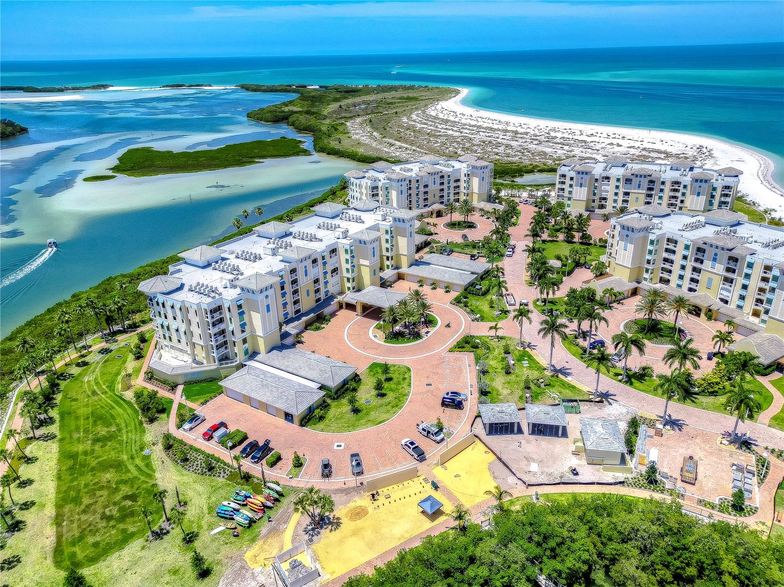 This beautiful end unit sustained NO WATER or WIND damage after Hurricanes Helene and Milton. Welcome to your coastal paradise located on picturesque Tierra Verde in Sunset Pointe on Collany Key! This breathtaking 3-bedroom, 3.5-bath ocean front condo is nestled within a gated community, ensuring both privacy and security.  The move in ready residence comes beautifully furnished and features two private balconies, providing captivating views of the Gulf of Mexico, spectacular sunsets, and the pristine, white sandy beach. Situated adjacent to an 1800-acre state preserve, nature’s beauty surrounds you at every turn but most importantly the magnificent beaches just steps away. Access your sanctuary via the semi-private elevator that opens directly into your space where each bedroom boasts its own ensuite bathroom for ultimate comfort and privacy. The kitchen is a culinary masterpiece, outfitted with luxury stainless steel Wolf and Subzero appliances, a wine refrigerator, and plenty of counter space for cooking and entertainment.  Elegance meets functionality with hard-wired window and door treatments, leak defense system, remote-controlled hurricane shutters, upgraded Pelican water softener and filtration system, and a spacious fully equipped laundry room complete with a Whirlpool washer and dryer, large sink, and ample folding counter space. This condo has been enhanced with custom designer finishes and upgrades.  With over $79,000 in luxurious custom upgrades, including elegant porcelain tile flooring, an expanded counter-height center island with seating, an extended tray ceiling above the island, pristine Quartz countertops, sophisticated crown molding, custom closets, opulent glass enclosures for the tub/shower, and premium cabinetry. The primary suite is sure to please with panoramic ocean views and access to the wrap-around Gulf view balcony, perfect for unwinding. The lavish ensuite bathroom is designed to pamper, featuring a standalone soaking tub, a roomy walk-in shower with three water heads, and expansive dual vanities, creating a spa-like atmosphere that indulges the senses. Your two-car garage, conveniently situated at the front of the building, features a covered walkway leading to your semi-private elevator. Additionally, your personal storage closet is conveniently located next to the elevator foyer. The incredible community amenities include, a Geothermal pool & spa, bocce ball courts, putting and chipping green, gas firepits, a covered outdoor kitchen, bar, and barbecue facilities, a waterfront scenic boardwalk with tranquil sitting areas, kayak launch, vehicle charging stations, well-equipped fitness room, fishing dock, dog park and PRIVATE BEACH. Here you are surrounded by some of the most beautiful beaches and waters on the Gulf Coast.  For outdoor enthusiasts who like to play golf or tennis the Isla Del Sol Yacht and Country club is 5 minutes away.  For pickleball players, the Tierra Verde Community Association is nearby. For professional sports, the MLB, NHL, and NFL teams are within 15-40 minutes of drive time. This property is perfect for those who want to be close to the action of downtown St. Petersburg, with its entertainment, arts, shopping, and fine dining. If you’re a jet setter, St. Pete/Clearwater International Airport is just 25 minutes away and Tampa International Airport is 40 minutes away. Experience private luxury living at its finest! Call for your exclusive showing of this stunning luxury residence.