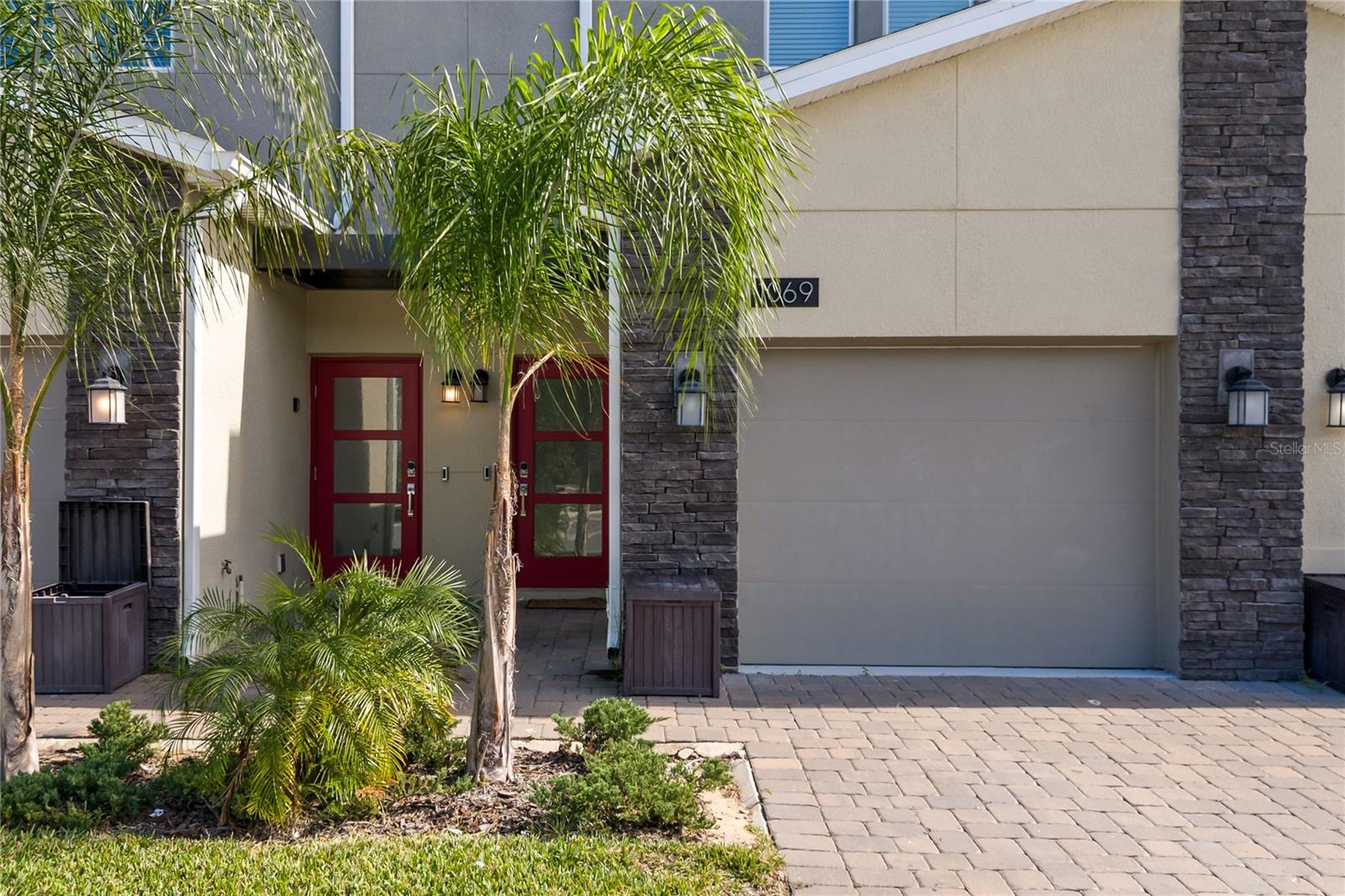 Welcome to this exceptional opportunity in the highly sought-after resort community of ChampionsGate! This immaculate townhome features 3 spacious bedrooms and 2 full bathrooms, making it the perfect choice for a primary residence, vacation getaway, or high-potential investment property. Open-Concept Design: Bright and airy living spaces filled with natural light, perfect for entertaining family and friends. Modern Kitchen: Fully equipped with stainless steel appliances, sleek cabinetry, and premium counter-tops. Comfortable Layout: Generously sized bedrooms, including a private master suite with like in-suite bath. Resort-Style Living: Residents and guests enjoy exclusive, world-class amenities at the famous Oasis Club, featuring a resort-style pool, lazy river, water slide, private cabanas, state-of-the-art fitness center, movie theater, and on-site dining. Golf enthusiasts will also love being minutes away from championship golf courses. Unbeatable Location: Perfectly situated at 1069 Splash Shot Place, you are just a short drive from Walt Disney World, premier shopping centers, and top-tier dining options, with quick access to major highways. ChampionsGate with short-term rental approval and strong vacation rental potential.