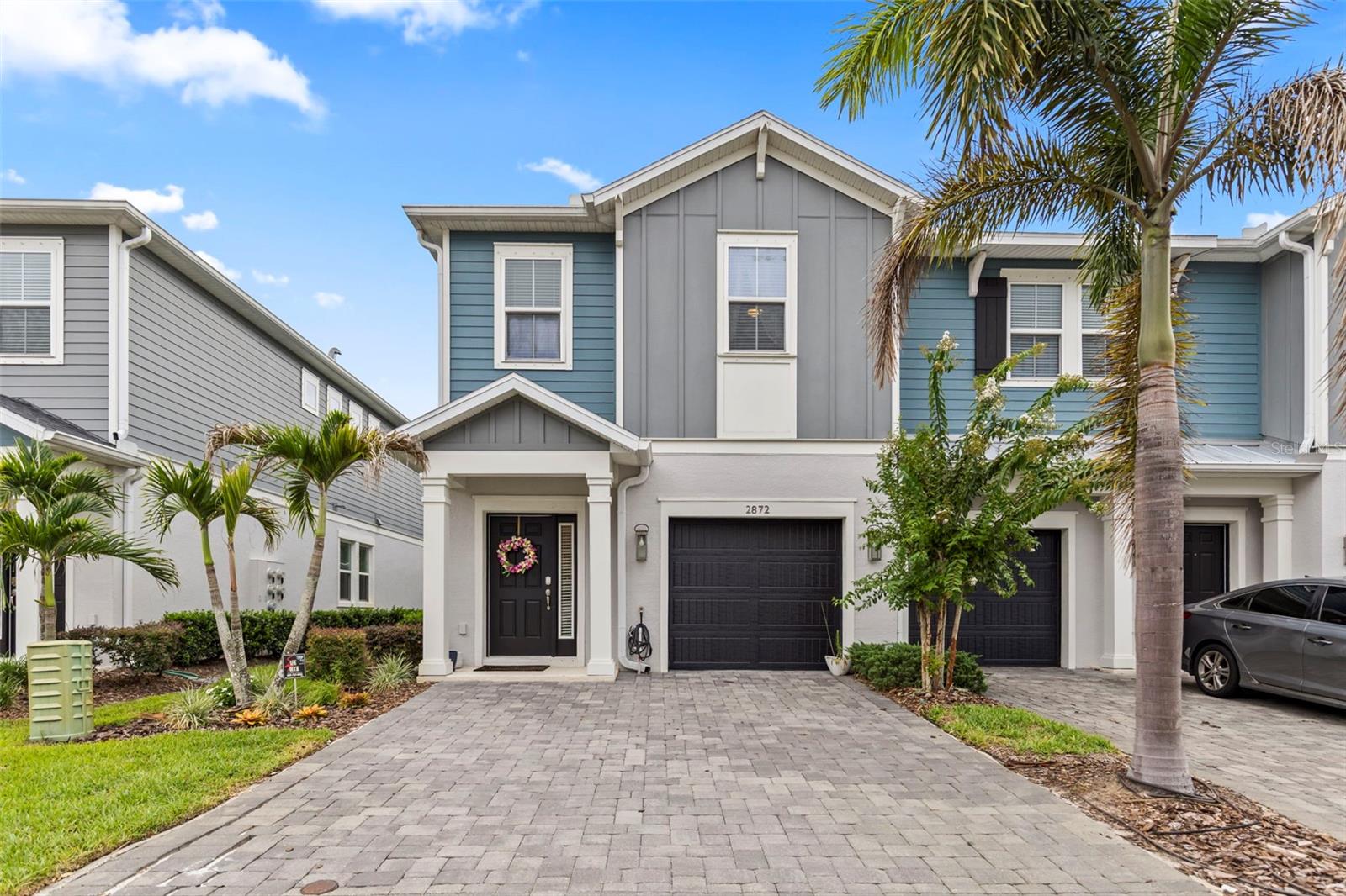 This AMAZING Carrollwood townhome, located in a quiet gated community of only eighty-one homes and a gorgeous community pool, is available for you to call home!  This end unit features an open-concept first floor with additional windows that provide abundant natural lighting throughout the day and opens out onto an extended covered and screened lanai that overlooks the pond and woods that is full of beautiful wildlife. There are countless upgrades throughout the home which include luxury vinyl flooring and porcelain plank throughout, a gorgeous kitchen perfect for entertaining with an oversized island with seating AND a dinette area, stainless steel top of the line appliances, granite countertops, a butler's station, walk in pantry and tons of closet storage.  The second floor features an enormous loft, overly spacious bedrooms with walk in built out closets, a large laundry room and a primary bath with a soaking tub, dual vanities, walk in closet and a small flex space that can be additional storage or a small workstation space.  Convenience is at your doorstep with the community pool located less than fifty yards away, a dog walking area directly across the street, and a public park with tennis and sports fields just one block over.  Lawn Maintenance and Pest Control are included.  Hurry this one won't last long!