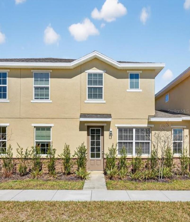 Virtually Staged. Beautiful 4-bedroom, 2.5-bath townhome built in 2021, offering 1,620 sq. ft. of modern living space. Features an open-concept floor plan, stainless steel appliances, kitchen island, spacious primary suite with walk-in closet, and laundry room., ceramic throughout the first floor. Conveniently located in Davenport, just minutes from Posner Park, shopping, dining, medical facilities, I-4, and US-27. Situated next to the new Walmart currently under construction, providing added convenience and future growth potential. Perfect as a primary residence, vacation home, or investment property.