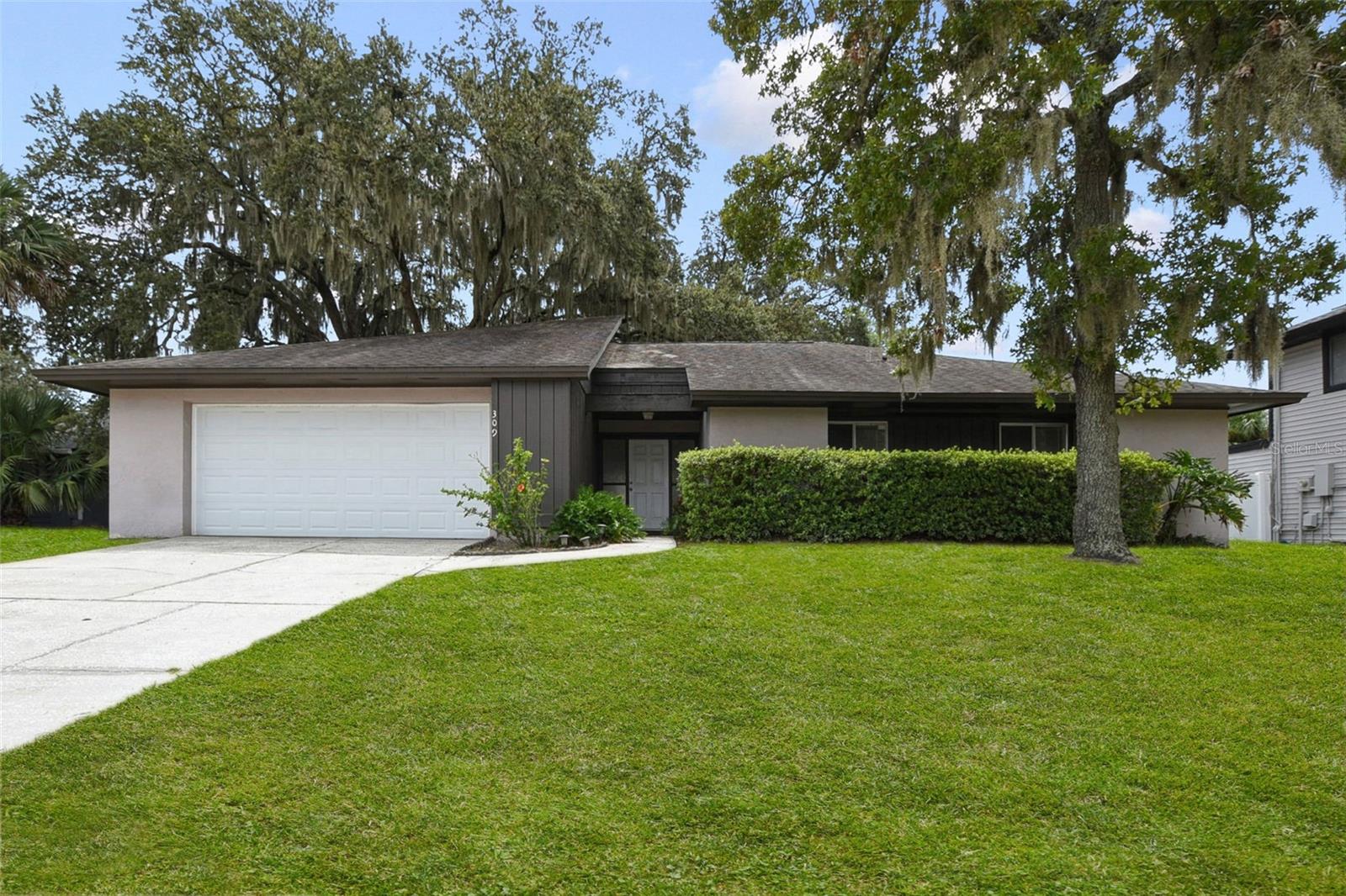WELCOME HOME to this charming single-family house in the desirable Sterling Park Community which is centrally located close to UCF,
Full Sail, Rollins College and Winter Park. This home offers 3 bedrooms and 2 bathrooms.  A large spacious eat-in kitchen, along with a sizable Great Room with vaulted ceilings!  The Great Room includes a wood burning fireplace as a focal point, ranging the full height of the
vaulted ceiling.  Ceramic tile covers the living area, kitchen and bathrooms.  There is new carpet in the bedrooms.  The entire inside of the home has been freshly painted a nice neutral color for its new owners!  Newer Roof was installed in 2018.  New Garage Door motor 2025.
There is a screened in porch to enjoy fresh air with your morning coffee!  The large backyard is a clean slate!  You have plenty of room!
In fact, you have room to add a pool and will still have yard available for your family and/or pets to play!
This home is a clean slate!  You have the opportunity to put your own stamp on it, making it your own!  It is located just minutes from
shopping, dining and major highways! No matter what you need, it is close by!