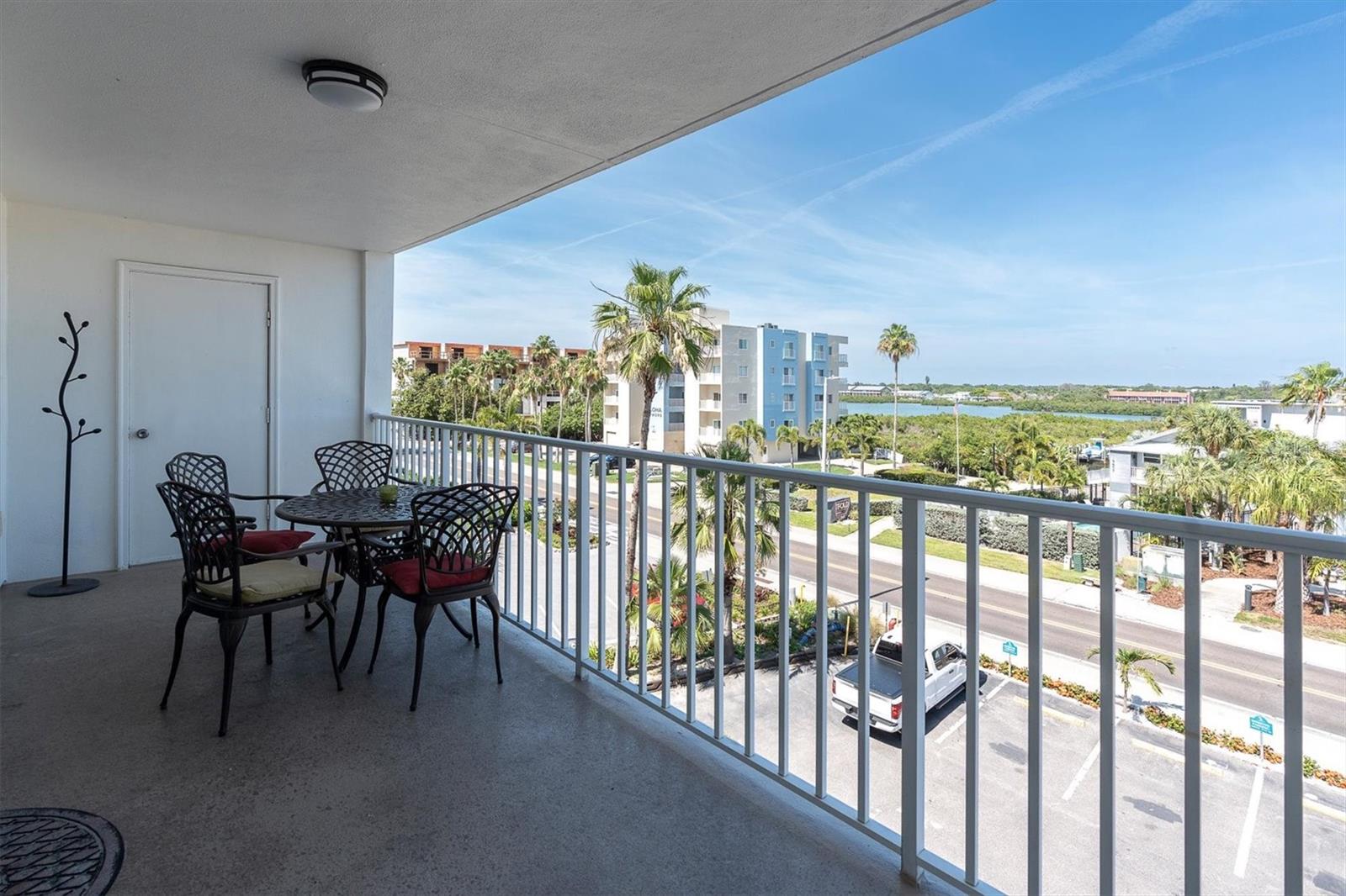 Experience the ultimate in sun, sand, and surf at one of Florida's premier west coast beach 
destinations. This condominium is situated in the charming town of Indian Shores, nestled just 
south of Clearwater and north of St. Pete. Located on the third floor of Holiday Villas 2, this 
condo offers direct access to the stunning sugar sands of the Gulf of Mexico. 
Spanning 1,100 square feet, this spacious condo features two bedrooms and two full bathrooms, 
complemented by a generous living and dining area perfect for entertaining family and friends. 
Enjoy the tranquility of a large private balcony with views of the Intracoastal Waterway, ideal for 
savoring your morning coffee or an evening drink. Newly installed sliding doors provide excellent 
views from inside while ensuring peace and quiet. 
The balcony includes a sizable storage closet for all your beach essentials. The kitchen boasts 
updated granite countertops and ample seating at the counter, while the bathrooms have been 
tastefully modernized. An assigned under-building parking space is included for your 
convenience. 
Holiday Villas 2 offers a heated pool with restroom facilities and a grilling area equipped with 
both gas and charcoal grills. Condo #308 is being sold fully furnished, presenting an excellent 
opportunity for a beachfront home, winter retreat, or investment property, as short-term rentals 
are permitted. Within walking distance, you'll find a variety of restaurants, bars, shops, and 
mini-golf. This condo is competitively priced and represents one of the best values on the 
beach. Don't miss the chance to make it yours before it's gone!