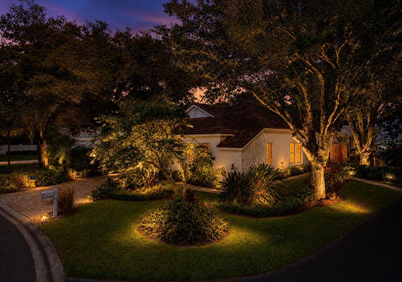 Enchanting property surrounded by mature trees and pristine nature, nestled in a serene cul-de-sac within Tampa Palms. This residence exudes curb appeal with a pavered driveway, lush landscaping, and an air of quiet sophistication.
Step inside to an open, flowing layout accentuated by rich wood floors and crown molding. The inviting family room features a wood-burning fireplace, bathed in natural light and enhanced by refined finishes. The gourmet-style kitchen showcases granite countertops, stainless steel appliances, and sleek, timeless design. A bright breakfast nook / flex space with a built-in desk offers versatility for dining, work, or relaxation.
The grand master suite is flooded with natural light and French doors opening to the covered lanai. The master bath is exquisitely renovated with dual vanities, a freestanding tub, and designer tilework that elevates spa-like serenity.
A private outdoor patio is designed for seamless entertaining and outdoor living. A new jacuzzi is surrounded by ample seating areas, perfect for unwinding under the Florida skies.
Brand-new double-pane windows throughout for superior energy efficiency. A metal roof with a tile-like appearance, upgraded lighting, and modern ceiling fans enhance comfort and style.
Enjoy all the amenities Tampa Palms offers, with convenient access to shopping, dining, highways, and hospitals. This is an exemplary home for discerning families seeking elegance, comfort, and memorable moments.
This is the quintessential luxury residence for family living and refined entertaining.