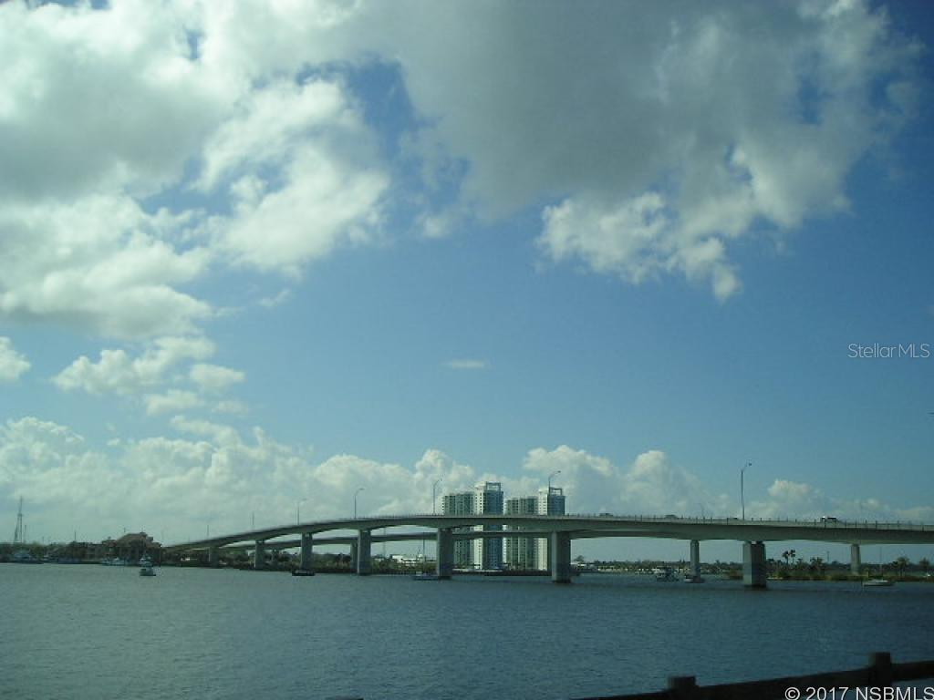 RIVERFRONT COMPLEX -  WATCH SUNSETS OVER THE RIVER FROM DOCK. SHORT WALK  TO OCEAN!!  SUNNY & BRIGHT CORNER UNIT HAS NEW CARPET THROUGHOUT.  IMMACULATE LANDSCAPED COURTYARD, PEACEFUL COMPLEX, ON SITE LAUNDRY.   HOA fee includes water, sewer, trash, bldg insurance, lawn maint., pest control.   Close to Entertainment Zone ;LocationDescription: Condo ;Water: City
