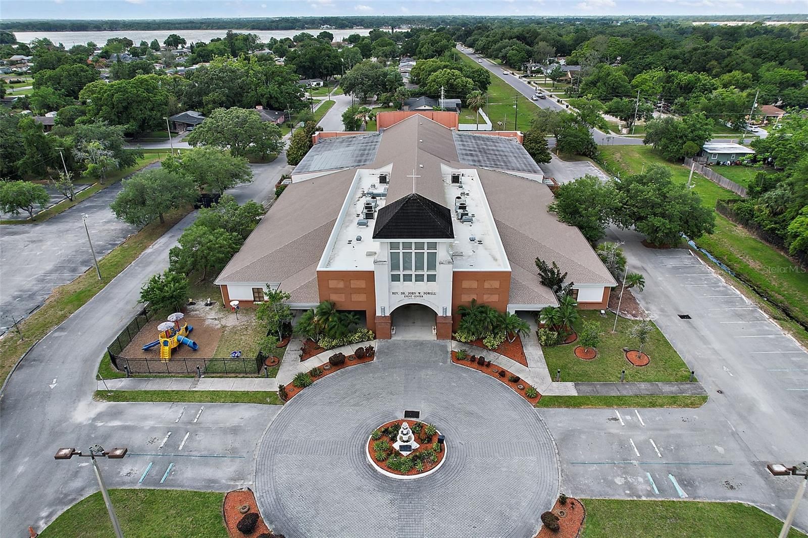 PRIME DOWNTOWN ORLANDO - 3.86 ACRES | DIRECT SR-408 ACCESS | OPPORTUNITY ZONE. Welcome to 1 S Cottage Hill Road — a high-impact urban redevelopment site strategically positioned at the gateway to Downtown Orlando. This rare 3.86-acre parcel features a 30,044 SF existing institutional facility with 242 parking spaces and highway visibility exceeding 48,000 vehicles daily. The property is currently zoned R-3B with existing density allowances and future AC-N Neighborhood Activity Center potential supporting residential development, expanded commercial uses, and increased height. This offering combines location, scale, infrastructure, zoning upside, and incentives in one of Central Orlando’s most strategic growth corridors. With over $500,000 in recent capital improvements including modernization of the sanctuary (new sound systems, epoxy flooring, chair seating, and interior paint and 3 new HVAC systems , the site supports immediate adaptive reuse while redevelopment approvals are pursued. Current use includes an updated sanctuary with seating for 800-1200 seats, commercial kitchen, administrative offices, classrooms, banquet/event center with 9 airwalls allowing for multiple uses.  Ideal uses include ministry & community hub, multi-family housing, mixed-use development, senior living, charter school campus, regional campus relocation, career academy or church relocation. 
Your new location includes exceptional frontage on John Young Parkway (266’) and immediate SR-408 access, delivering unmatched visibility and accessibility.  Surrounded by hundreds of millions in public and private investment, including stadium redevelopment and neighborhood revitalization, this asset is positioned for transformational growth. Located adjacent to Camping World Stadium, Exploria Stadium, Parramore Heritage District, and West Lakes Revitalization, the asset sits within both a Federal HUBZone and Opportunity Zone — offering layered incentive potential. 
1 S Cottage Hill Road represents a rare large-scale urban infill opportunity in Orlando’s fastest transforming redevelopment corridor allowing you to reuse the existing land to meet modern demands. This site combines land, location, incentives, and infrastructure. Most projects only get two of those — this one gives you all four. Immediate adaptive reuse or full redevelopment. Call for a tour of the facility and lot.