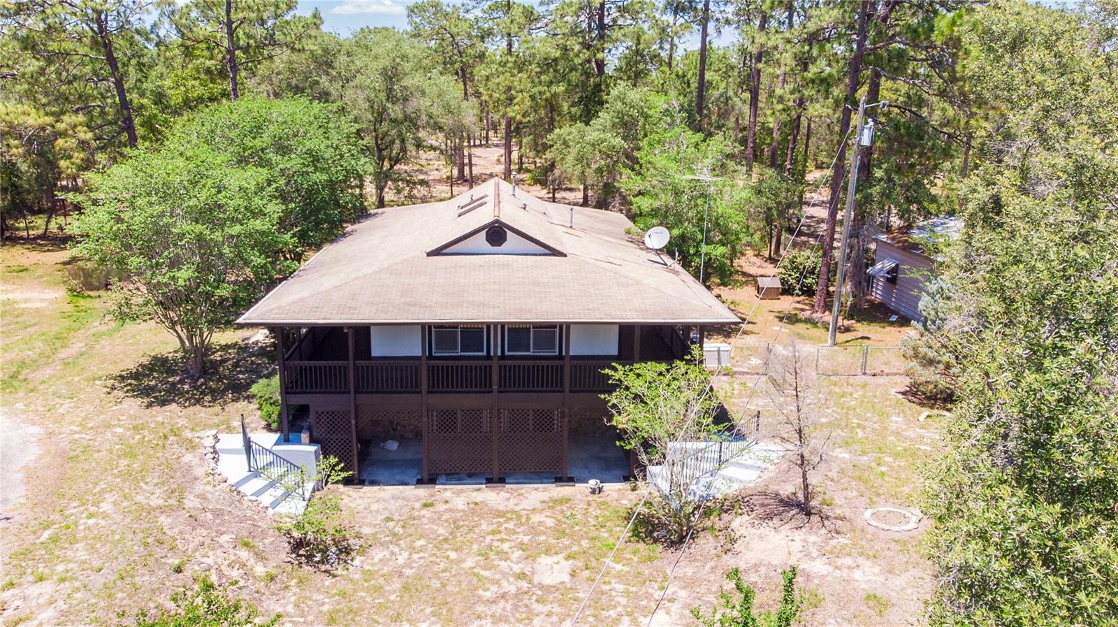 Rare remodeled 10+ acre fenced farm estate in the heart of Florida Horse Country, ideally located near World Equestrian Center, Rainbow Springs State Park, Ocala, Dunnellon, scenic equestrian trails, freshwater rivers, and state forests. Situated on paved road frontage with the back 5 acres recently cleared for expansion, this move-in-ready property features a wraparound porch, spacious living areas, lower-level flex space, gas fireplace, remodeled interiors, new septic system, multiple sheds, chicken coop, and breathtaking sunset views overlooking a large peanut and livestock farm.

Perfect for equestrian living, homesteading, horses, RV storage, farming, multigenerational living, retreats, or future estate development, this Central Florida ranch offers usable acreage with endless upside in one of the nation’s fastest-growing luxury rural and equestrian markets. Conveniently located near the new Sunshine State Parkway access for easy travel toward Tampa, St. Petersburg, Orlando, and Florida’s Gulf Coast, this is a rare opportunity to own a versatile farm property in the Horse Capital of the World. Motivated seller — bring your vision and move quickly.

#WorldEquestrianCenter #OcalaHorseCountry #FloridaHorseProperty #EquestrianEstate #HomesteadLiving #RainbowSprings #FarmForSale #LuxuryRanch #CentralFloridaRealEstate #HorseCapitalOfTheWorld