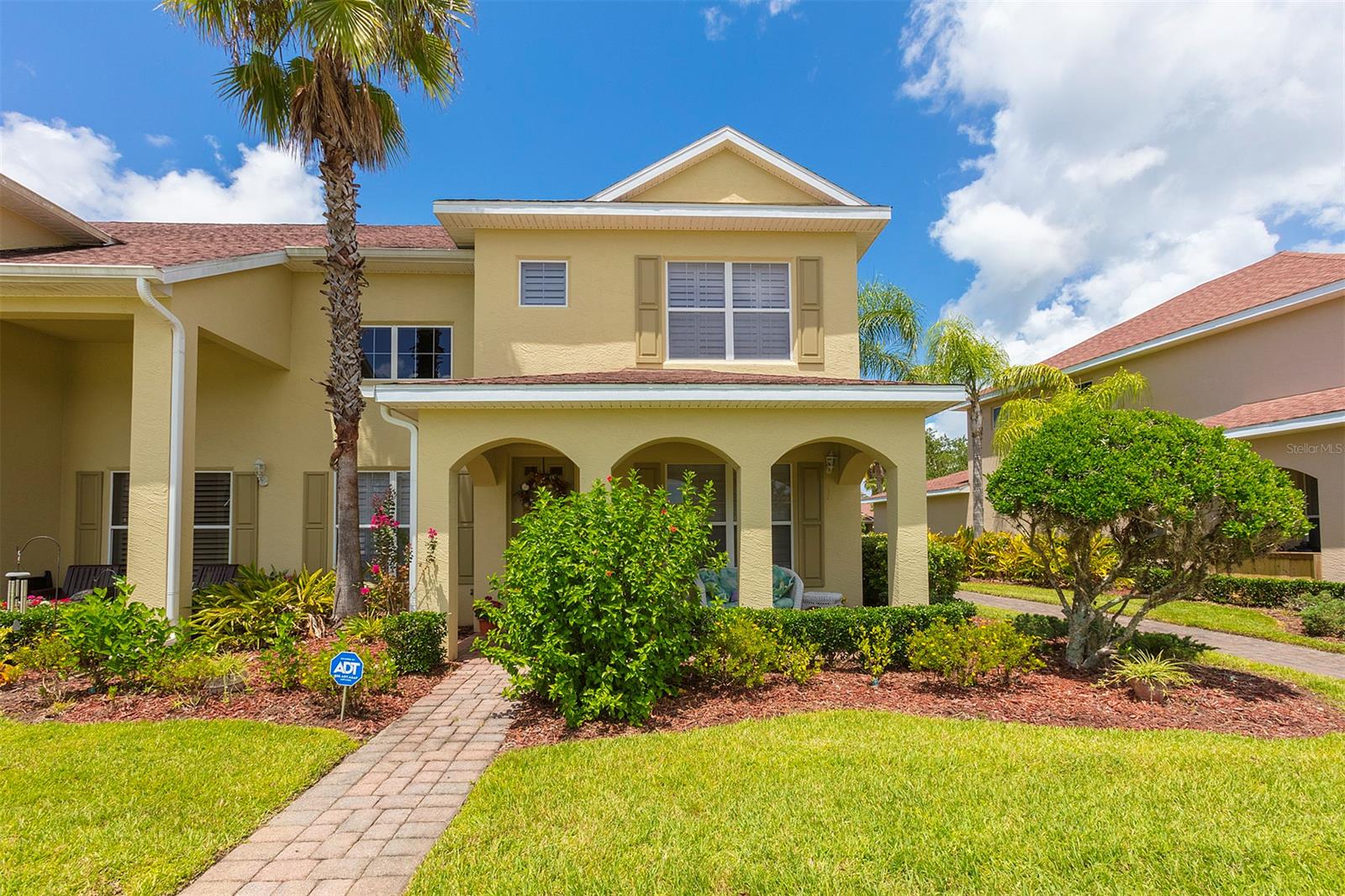 Convenient and care-free living awaits from this charming attached property nestled in the Parkside Townhomes section of Venetian Bay. A spacious open floor plan welcomes you as you enter, with one bedroom downstairs and beautiful plantation shutters throughout the residence. The updated kitchen provides wood cabinetry with stainless appliances and granite countertops. The master bedroom is oversized and features a dual-sink vanity in the master bath. Owners here enjoy the easy access to the community swimming pool, restaurants, shops, the spa and more. Come view today and secure your New Smyrna Beach retreat. ;Water: City