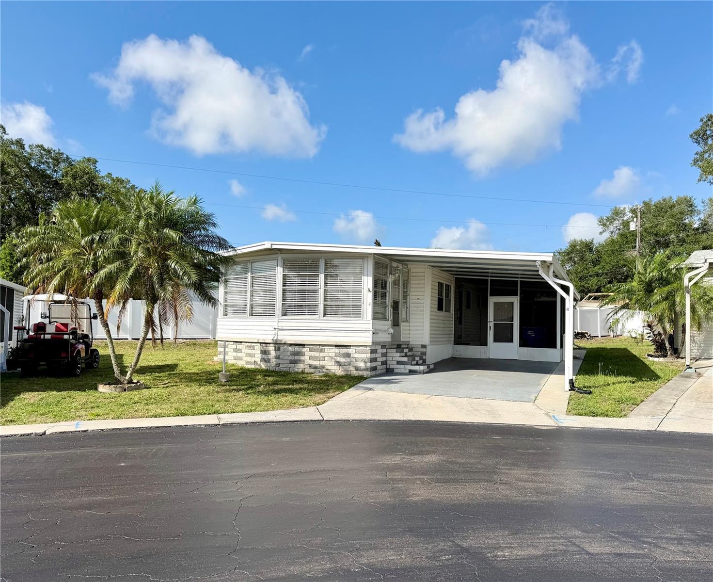 Welcome to Edgewater Pines MHP — a friendly, waterfront 55+ community where comfort meets convenience!  
This inviting 2-bed, 2-bath home is one of the few in the community that is NOT located in a flood zone, giving you added peace of mind.

The home is filled with natural light and offers a spacious layout, a cheerful front sun porch, and a relaxing side screened patio—perfect for enjoying Florida’s beautiful weather. While the home could benefit from some personal touches and updating, it provides a wonderful opportunity to make the space truly your own.

You’ll love being just 5 minutes from shopping, dining, movie theaters, community centers, medical facilities, and the Pinellas Trail. And with the Gulf beaches only minutes away, every day can feel like a vacation.

Whether you’re looking for a full-time home or a warm winter retreat, you’ll enjoy the welcoming lifestyle that Edgewater Pines is known for.

Purchase includes a $50,000 share.