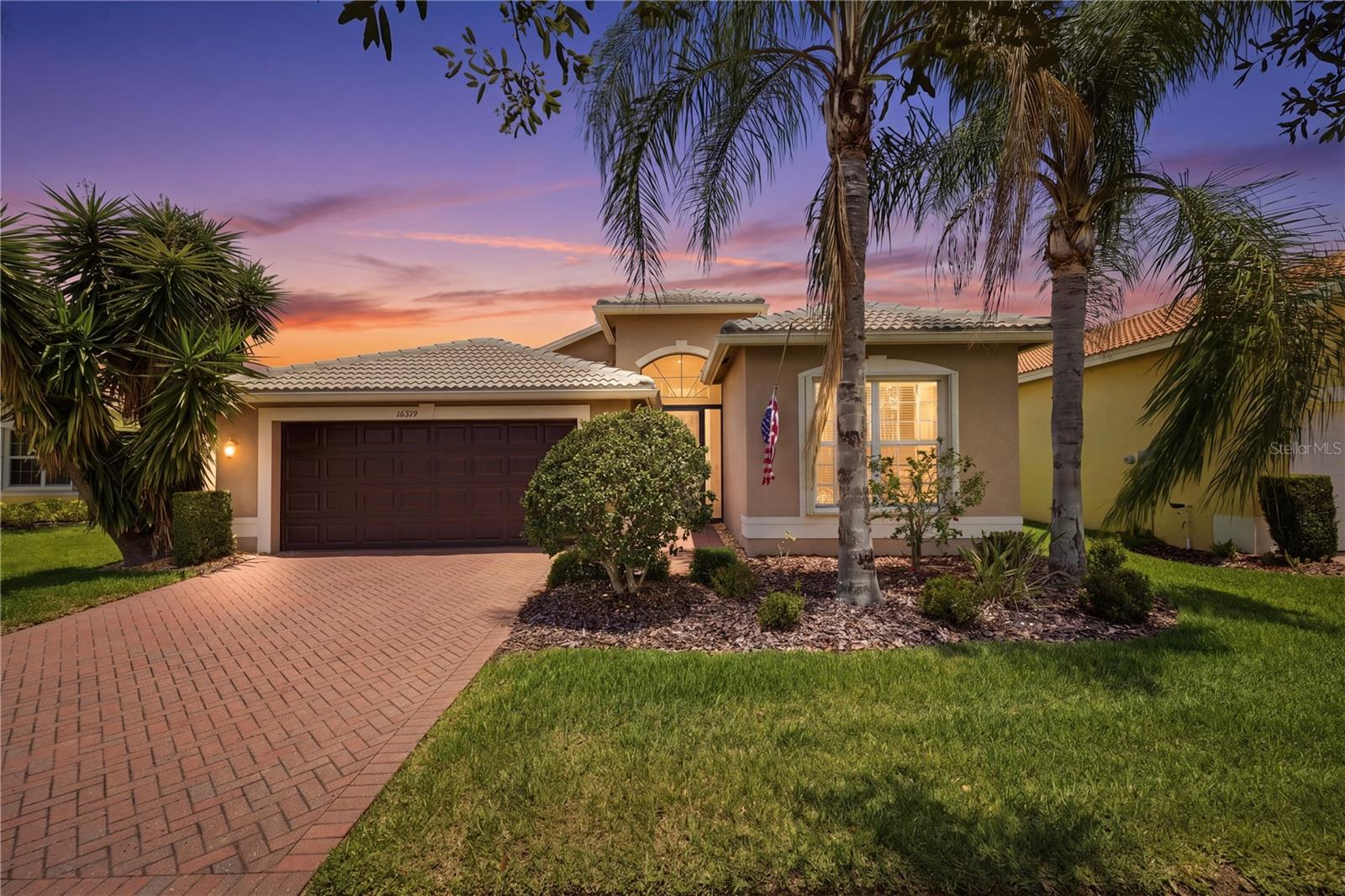 Discover this impeccably maintained 3-bed, 2-bath home with over 2,000 sq. ft. of inviting living space. Backing up to a tranquil pond and complete with a screened-in lanai, it’s the perfect setting for relaxing and taking in nature. The open kitchen is designed for entertaining; the spacious primary suite includes a generous en-suite bathroom and the acacia wood floors throughout the house adds a desired richness. Pride of ownership shines throughout; this home has been beautifully cared for over the years and it shows! Positioned in Flood Zone X for added peace of mind, it offers easy access to Tampa Bay and is just about 30 minutes from Downtown Tampa. Enjoy luxury community amenities including a resort-style pool, resistance pool, whirlpool spa, and an on-site restaurant, all part of a grand clubhouse featuring fitness and arts facilities. Don’t miss out-schedule your private tour today!