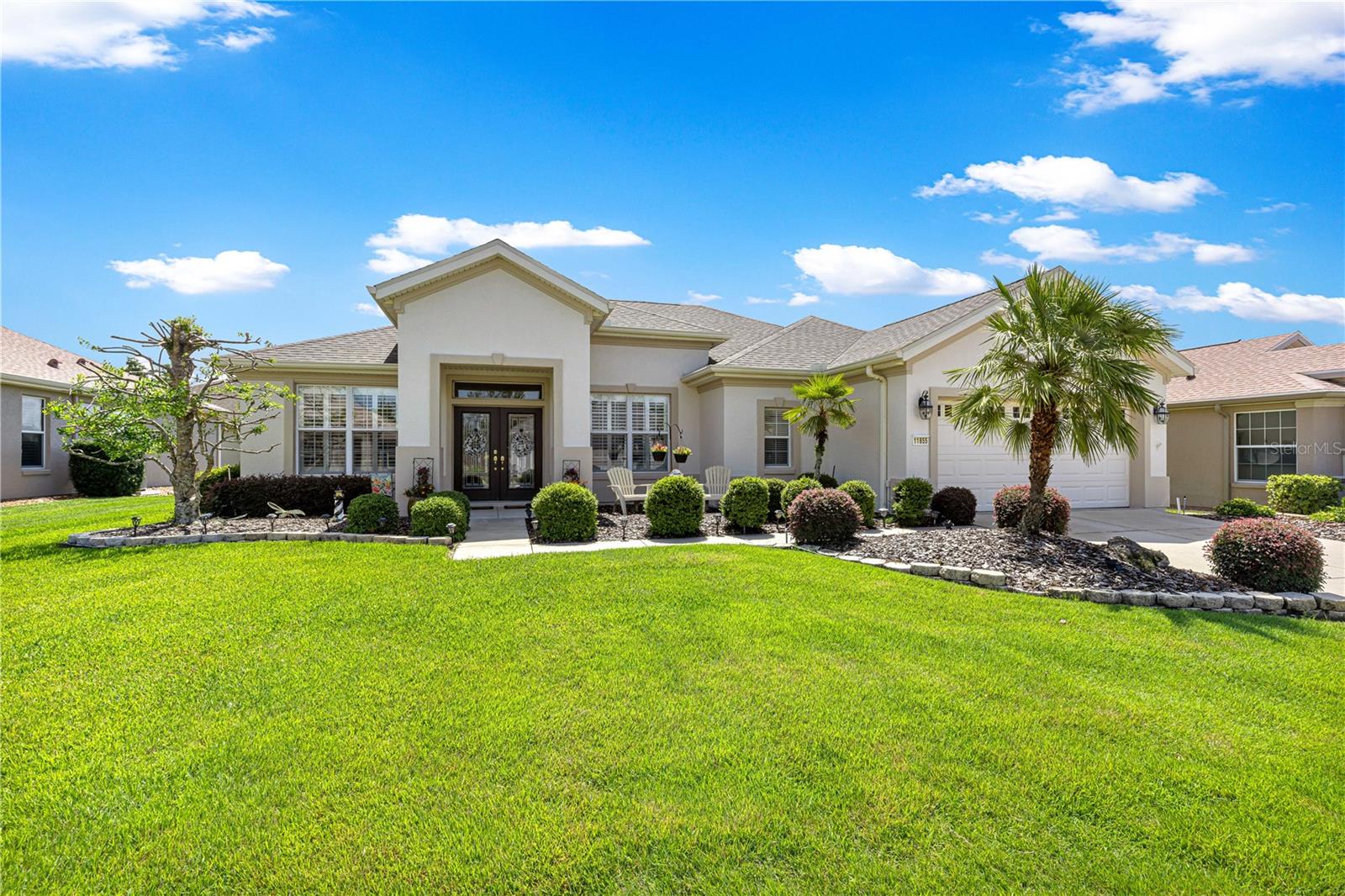 Desirable Granville model with stunning open views.  Welcome to this beautifully maintained home offering 2 bedrooms and 2 baths plus a versatile den--the perfect blend of comfort, style, and functionality.
From the moment you arrive, you'll appreciate the elegant custom glass front double entry doors.  Inside you will find crown molding in several rooms, plantation shutters throughout, and an open, light-filled floor plan designed for easy living.
The spacious kitchen features stainless steel appliances and tile flooring laid on the diagonal, which continues through the kitchen, great room, dining room, bathrooms, and laundry room. The den and bedrooms offer the warmth and comfort of carpeting.
One of the home's standout features is the super-sized enclosed lanai, complete with tile flooring, acrylic windows, and blinds, creating the perfect space to relax year-round while enjoying the expansive opens view with no homes directly behind.
Additional highlights include roof re-shingled 2025, HVAC new in 2018, laundry room with extra cabinets, extended garage with pull down- stairs to attic storage area.  Interior recently painted and ceiling and walls have been re-piped
All of this in the popular Del Webb community loaded with activities,