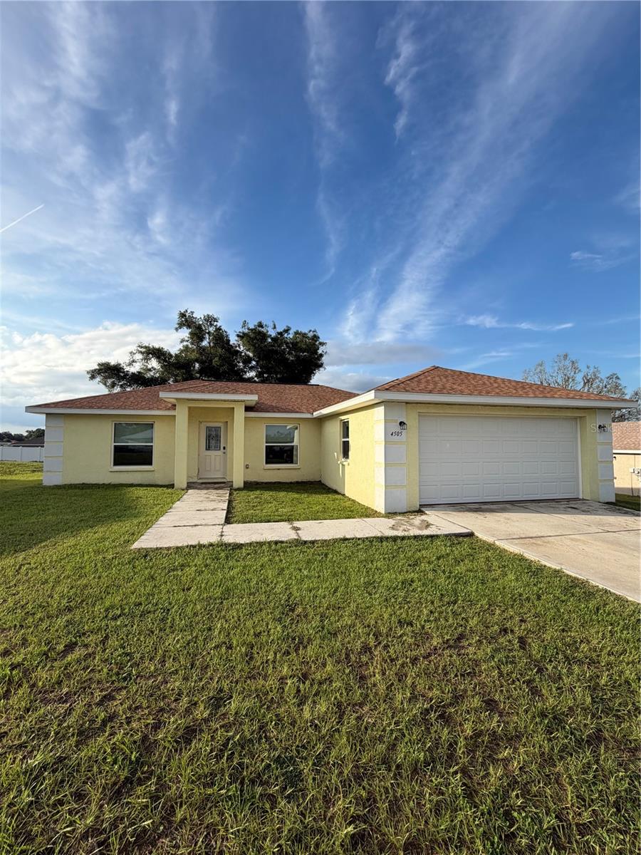 Please text Nancy for showings and inquiries. This modern 3-bedroom, 2-bathroom, 2-car garage single-family rental home in offers 1,276 square feet of contemporary living space. Constructed recently in 2025, this immaculate property sits on a spacious 0.31-acre lot providing a comfortable, open yard. Designed for low-maintenance functionality, the interior features tile flooring throughout, cathedral ceilings, a master suite with a tiled walk-in shower, a guest bathroom with a durable tile-surround tub, and a kitchen equipped with elegant granite countertops and a pantry. Situated in a highly accessible part of Citrus County, the property provides seamless access to localized medical facilities, shopping centers, and the charming historic downtown district. The home is available for lease starting July 15th with a $1,000 security deposit required. All utilities and yard maintenance are the responsibility of the tenant, though yard maintenance can be included for a total rental price of $1,975 a month.
