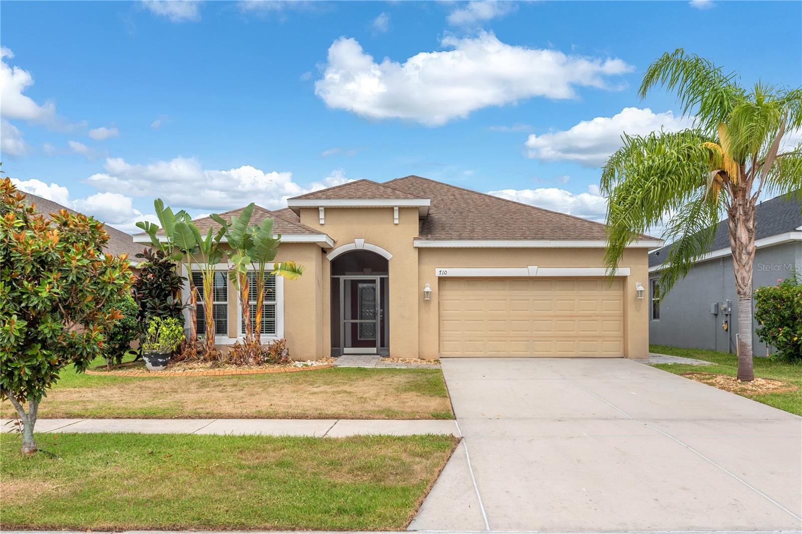 Move-In Ready, Immaculate 3 bedroom, 2 bath, 2 car garage home in the desirable community of Bahia Lakes in Ruskin! 
Features and Upgrades Include: Stone Paved and Covered Entry, Ceramic Tiles and Wood-Laminate Floors Throughout, Open Floor Plan, Spacious Kitchen Overlooking the Great Room, French Doors to the Amazing Oversized Oasis Screened-In and Open Patio with Fire Pit, and Fenced Yard! Upgraded light fixtures, ceiling fans , cabinets in the interior laundry room, clean garage, low maintenance yard, papered sitting wall/area great for entertaining and more!
The split floorplan features a private primary suite with separate shower and tub and 2 additional bedrooms and a bath towards the front! The Bahia Lakes offers a community pool, playground, a great location close to shopping, restaurants, the newer hospital and more near US-41 in Ruskin and close access I-75! Call today for more details!
