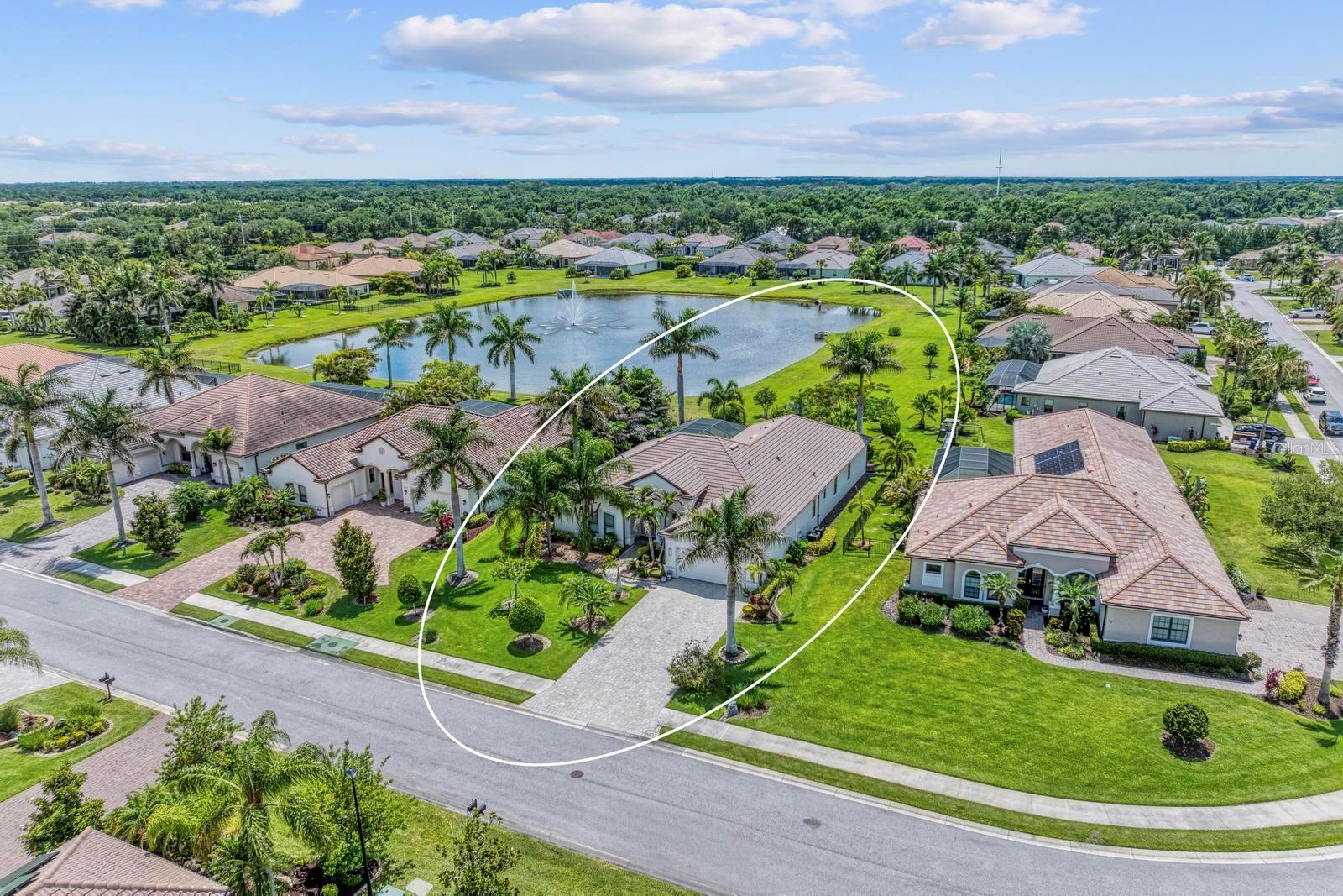 Magnificent luxury home located in an exclusive gated community of only 68 homes in one of the most desirable prime locations in Bradenton. This beautifully designed residence offers nearly 3,000 square feet of elegant living space with 4 spacious bedrooms, 3 full bathrooms, a den, a large bonus room, and a 3-car garage, perfectly designed for comfort, entertaining, and everyday living.
Built with exceptional attention to detail, the owners selected premium upgrades throughout the home when it was originally built, including one of the most desirable lake view lots in the community. From the moment you arrive, the impressive double glass entry doors, paver driveway, and beautifully landscaped exterior create a stunning first impression.
Inside, the grand foyer opens to an elegant living room and formal dining area featuring crown molding, high tray ceilings, and an open, light-filled floor plan. The spacious family room showcases a unique custom-built entertainment center accented with elegant quartz countertops, creating the perfect space for relaxing or entertaining.  The gourmet kitchen is beautifully appointed with a built-in oven, upgraded finishes, and thoughtful design with stainless steel appliances, rich wood cabinetry, quartz countertops, and abundant space for gathering with family and friends. The spacious laundry room and thoughtful layout provide convenience and functionality throughout the home. Ceiling fans have also been added to every room in the home for enhanced comfort and style. A large bonus room offers endless possibilities and can be used as a private movie theater, exercise room, game room, or additional entertainment space. Large sliding glass doors fill the home with natural light while showcasing breathtaking lake views, creating the perfect indoor-outdoor Florida lifestyle. Step outside to your private oasis featuring a beautiful pool and spa surrounded by an expansive paver lanai, is ideal for relaxing, entertaining, and enjoying peaceful waterfront sunsets year-round.
Also, for peace of mind, two New air conditioning units recently installed on Jan 2026 with the radiant barrier in attic and zone heating and cooling system and also New water heater. 
This exceptional home truly has it all, luxury, space, elegance, upgraded features, and a premium lakefront setting in a highly sought-after gated community of Enclave at Country Meadows with NO CDD fees and low HOA is located conveniently minutes distance to Lakewood Ranch and to shopping, restaurants, and major highways and about half an hour driving distance to the famous beaches in Florida. A rare opportunity to experience upscale Florida living at its finest.