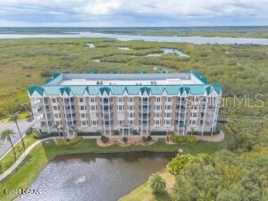 Top-Floor | Fully Renovated | Panoramic Ocean & Intracoastal Views This completely renovated, fully furnished top-floor condo offers an unparalleled coastal lifestyle with breathtaking sunrise and sunset views from two private balconies. Enjoy sweeping panoramic vistas of both the Atlantic Ocean and Intracoastal Waterway in one of Ponce Inlet's most desirable gated communities, Harbour Village Golf & Yacht Club.The kitchen is a showstopper, featuring quartz waterfall countertops and premium Café matte finish appliances. The open living space is bright and airy, thanks to all-new windows and sliding glass doors throughout. The primary bedroom offers ocean views and a beautifully updated en-suite bath with a double sink vanity and a large walk-in shower adorned with elegant glass tile work. Truly move-in ready just pack your bags. Harbour Village delivers resort-style living with access to a private beach club on the no-drive beach, a 9-hole par

par 3 golf course, tennis courts, fishing pier, three swimming pools, two fitness centers, a private on-site restaurant, and miles of scenic walking trails. Marina access with available boat slips completes this extraordinary lifestyle.