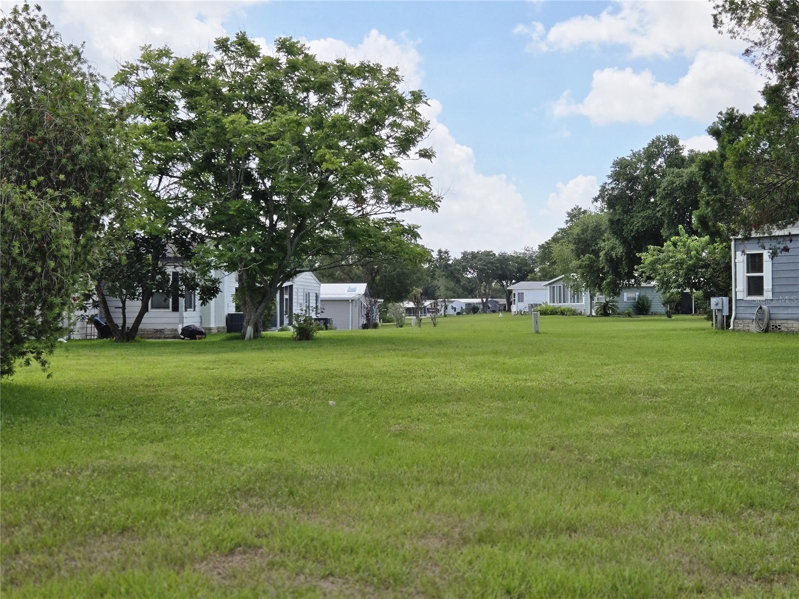 MOTIVATED SELLER Zellwood Station spans over 800 acres. The Community is RESIDENT OWNED 55+ GOLFING COMMUNITY.  Zellwood Station is a CO-OP community, there is no lot rent, HOA only. Amenities include a 72-Par golf course and our own Whistle Stop Restaurant. 4 pools, tennis and pickleball courts, RV storage area, banquet facilities and activities galore. We are a gated community with 24-hour guards. This is a privately owned Co-Op Share lot for sale. Lot is located in the Pet Friendly section.