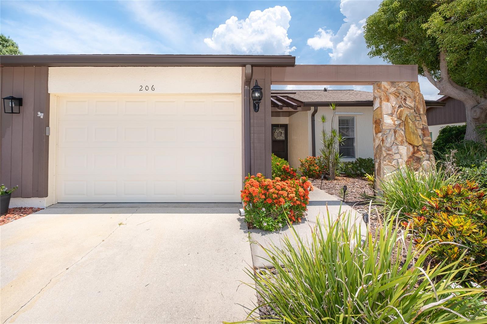 RARELY AVAILABLE, smaller 2-bedroom, 1-bath villa-style condo in the highly sought after, pet friendly, 55+ community of FOXWOOD! TURN-KEY & MOVE-IN READY just bring your suitcase! This light and bright open floor plan unit allows you to start living the relaxed Florida lifestyle you so deserve. Wow..the LANAI IS AIR CONDITIONED for those warm summer days when you prefer to be cool and collected while sipping your favorite beverage. The large outdoor patio is just perfect for entertaining and cooking up your summer favorites for family and friends! The kitchen is a Chef's delight with stainless steel appliances, plenty of cupboards and counter space and a breakfast bar for sipping your morning coffee and planning your events for the day. For your peace of mind Foxwood is located in an X FLOOD ZONE, the unit has HURRICANE PROTECTION for your windows and the ROOF WAS REPLACED IN 2023. Foxwood residents enjoy an active and friendly lifestyle with resort style amenities that make every day feel like a vacation: a heated pool and spa, clubhouse with social events year-round, bocce ball, pickleball, tennis, shuffleboard, library, and even a pool table. Enjoy your daily walks along the beautifully maintained sidewalks and grounds or relax by the pool with friends. The location of Foxwood is equally impressive and just minutes away from our beautiful beaches of Englewood and Manasota Key, and the sparkling Gulf waters. Sports enthusiasts can enjoy nearby spring training facilities for the Atlanta Braves and Tampa Bay Rays, while nature lovers can explore local state parks with hiking, kayaking, and birdwatching. Not to mention the nearby Historic Downtown Dearborn Ave. with casual dining, shopping, and evening entertainment. World class fishing and golfing are abundant in Englewood and provide hours of fun in the sun! Schedule your showing today and experience the lifestyle that Foxwood and Englewood is all about!