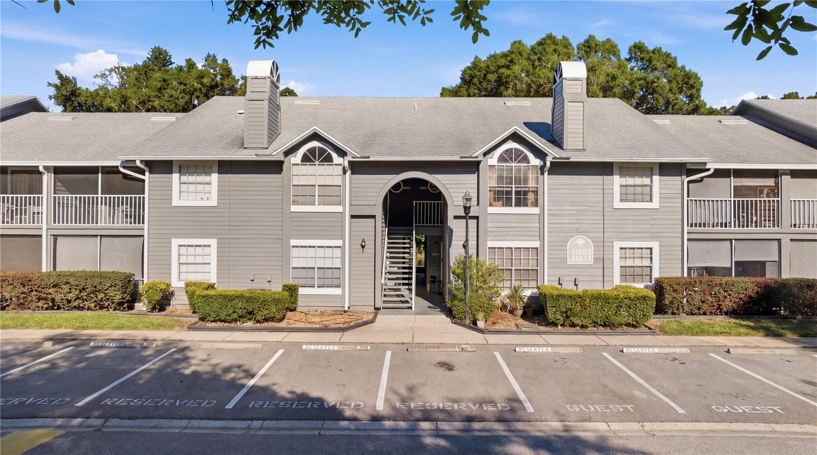 *Some photos have been Virtually Staged.* Welcome to this charming and spacious 2-bedroom, 2-bath condo located in the established and sought-after Raintree Village community near USF. Situated on the second floor within a low-rise, 2-story building, this home is surrounded by mature oak trees, peaceful pedestrian paths, and beautifully maintained grounds.

Inside, you’ll find a thoughtfully designed layout with generous living spaces, abundant natural light, and a seamless flow ideal for both everyday living and entertaining. The inviting living and dining areas create a warm atmosphere, while the well-appointed kitchen provides ample cabinetry and workspace. Both bedrooms are comfortably sized, including a spacious primary suite with its own private, renovated bath and plenty of walk-in closet space. Step outside to enjoy your private balcony overlooking a tranquil pond — the perfect place for morning coffee or enjoying the serene surroundings.

The HOA fee includes grounds upkeep, the master insurance policy, exterior maintenance, high-speed internet and cable, water, sewer, and trash, providing a comprehensive low-maintenance lifestyle. Also included is an assigned parking spot outside of the building. Residents enjoy access to community pools, tennis courts, and lush green spaces that make the neighborhood feel like a peaceful sanctuary within the city.

Ideally situated just minutes from the University of South Florida, Moffitt Cancer Center, AdventHealth, the VA Hospital, and major commuter routes including I-75 and I-275, this location offers exceptional convenience. Whether you're searching for a primary residence, a seasonal getaway, or an investment opportunity, this condo presents incredible value in one of Tampa’s most centrally located communities.