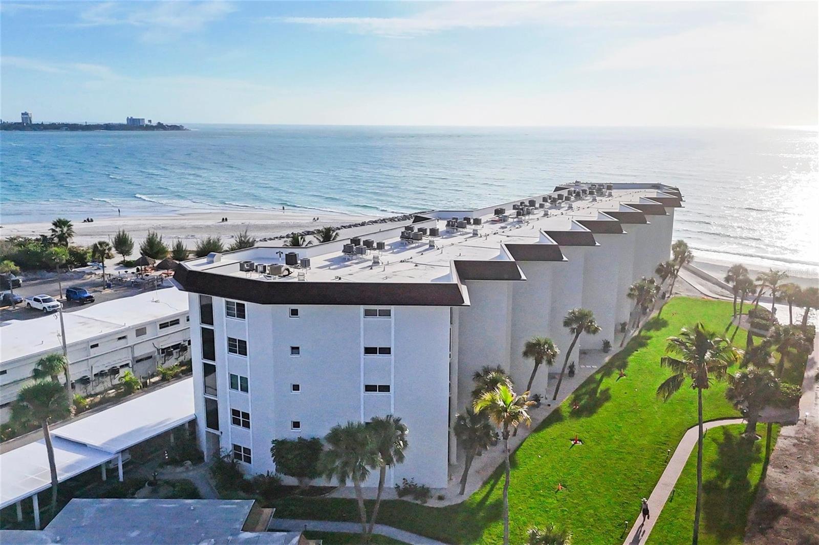 Experience coastal luxury in this updated residence at 2110 Benjamin Franklin Drive, Unit 104, ideally positioned on the south end of Lido Key. This spacious ground-floor condo offers the perfect blend of convenience and tranquility, with easy access and no elevators required.
Step inside to find a light-filled interior featuring an open-concept layout, high end finishes, and seamless indoor-outdoor living. The living and dining areas flow effortlessly to a Florida room, perfect for enjoying morning coffee or evening sunsets with tropical breezes. The kitchen is thoughtfully designed with modern cabinetry, quality appliances, and ample counter space—ideal for both everyday living and entertaining. The owner’s suite provides a relaxing retreat with generous closet space and an en-suite bath, while additional guest accommodations ensure comfort and privacy for visitors. Residents enjoy heated pool, clubhouse  and direct access to the pristine Gulf beaches just steps away. Located minutes from St. Armands Circle, fine dining, shopping, and downtown Sarasota, this property offers the ultimate in Florida coastal living. Whether you're seeking a full-time residence or a vacation getaway, this exceptional condo delivers location, lifestyle, and value.