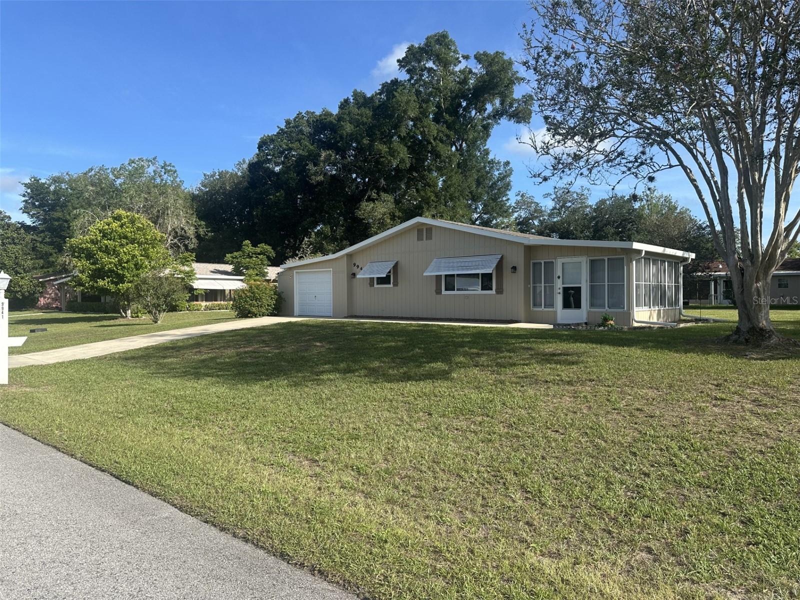 Move-in ready 2-bedroom, 2-bath home with a garage in the peaceful Pine Run Estates community. Featuring a brand-new 2024 central heating and cooling system, a 2020 roof, and updated windows from 2014, this 1,144-square-foot home sits on a quarter-acre lot, offering plenty of space to enjoy both indoors and out. The interior boasts a wonderful glassed-in lanai, fresh paint, and exceptional cleanliness. This is definitely one to add to your must-see list.