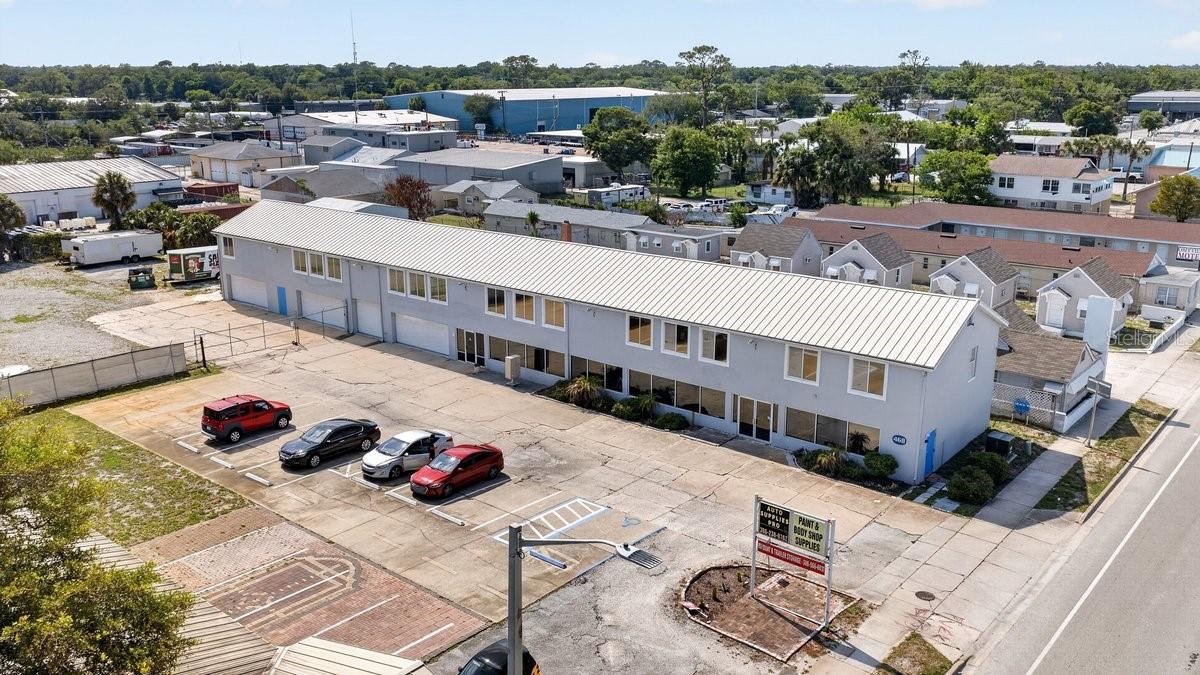 Premier Mixed-Use Commercial Holding -- Holly Hill US-1 Redevelopment Corridor An institutional-caliber investment opportunity in one of Volusia County's most actively repositioning submarkets. This CC1-zoned, mixed-use asset commands 150 linear feet of frontage along US-1 across a 1.03-acre parcel, and is improved with three stand-alone masonry buildings totaling in excess of 12,000 square feet, each fitted with newer galvanized metal roofing (2014 and 2017 installation). The property is strategically positioned within a four-mile radius of Halifax Health Medical Center, Daytona Beach International Airport, Daytona International Speedway, Daytona State College/UCF, and Embry-Riddle Aeronautical University, with direct connectivity to the A1A beachside corridor, I-95, and I-4.

The improvements support a diversified, multi-stream income profile. Building 1 (approximately 10,250 SF, two-story) is configured with two commercial suites, seven storage units, a private owner's residence, and four unfinished units offering meaningful value-add upside, supported by two recently installed HVAC systems and four supplemental mini-split units. Building 2 (approximately 1,420 SF) delivers three residential units -- two studios and one one-bedroom -- well suited to long-term or short-term tenancy. Building 3 (approximately 640 SF) comprises a stand-alone one-bedroom residence ideal for owner occupancy or supplemental rental income. A fully fenced half-acre rear yard currently produces ancillary revenue as a managed RV, boat, and trailer storage facility, with capacity for expansion or repositioning.
Located within Holly Hill's designated redevelopment district, the property may be eligible for municipal redevelopment grants and economic incentives (prospective buyers to confirm with the City of Holly Hill). The combination of flexible CC1 zoning, in-place cash flow, prominent US-1 visibility, and proximity to the region's principal employment, education, healthcare, and tourism drivers positions this offering as a compelling acquisition for developers, owner-operators, and long-horizon investors seeking durable income with substantial appreciation potential. Private tours available by appointment.