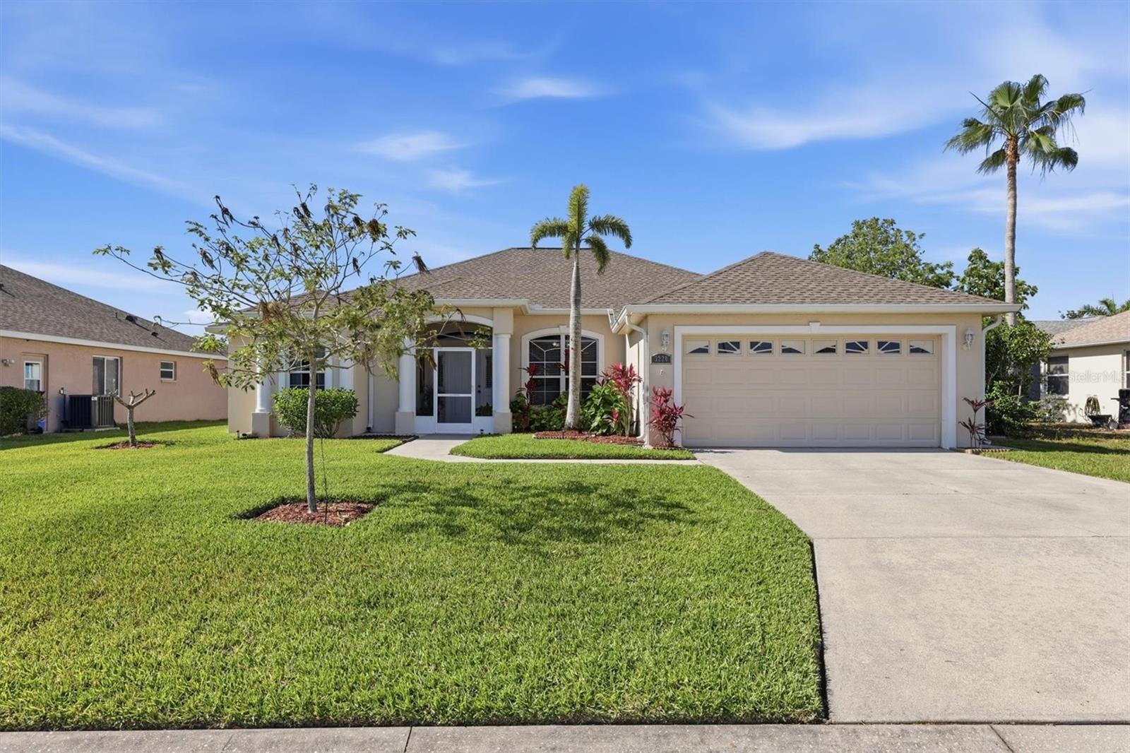 Welcome to 3220 45th Ave East in the quiet Wallingford community, a well-kept neighborhood known for its low HOA fees and great curb appeal. This move-in-ready home features a functional split floor plan with vaulted ceilings, plenty of natural light, and easy-to-maintain flooring with no carpet throughout. You’ll have peace of mind with a roof and HVAC both replaced in 2022, plus practical additions like a reverse osmosis system in the kitchen, interior laundry room, and a garage featuring built-in cabinets for extra storage and a portable generator connection. The primary suite is a true standout, offering two walk-in closets and a spacious bathroom with dual sinks, a garden tub, and a separate shower.  The screened lanai includes a convenient half bath that is perfectly positioned to serve as a pool bath if you choose to add one in the future. Outside, the meticulously maintained yard uses reclaimed water for irrigation and looks out over a peaceful pond with a preserve backdrop. This location is hard to beat, offering a direct drive to Bradenton Beach and quick access to University Town Center and the Sarasota-Bradenton International Airport.  The Bradenton home will not disappoint!