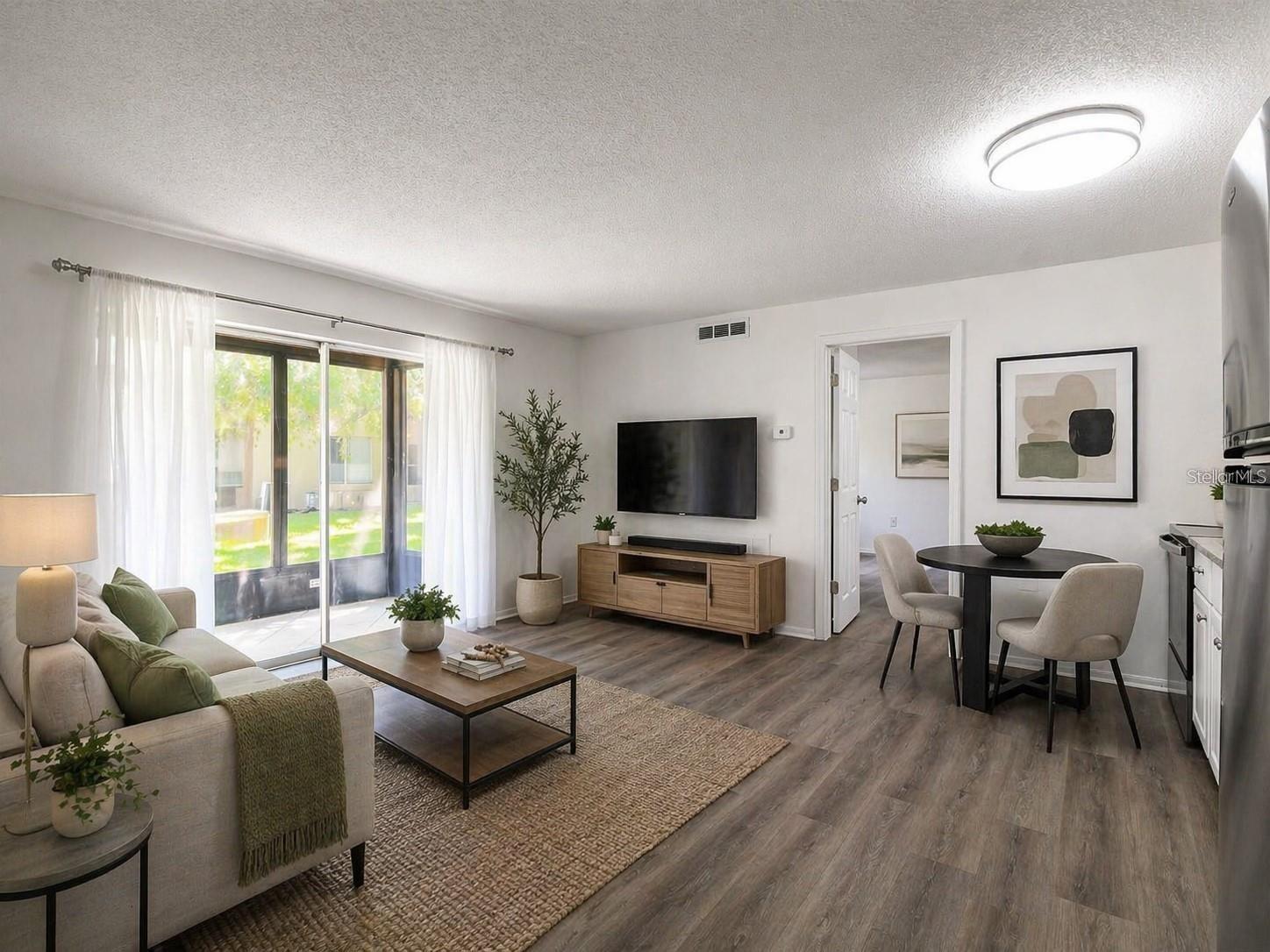 Completely renovated first-floor condominium available for rent in one of the area's most desirable communities. This beautifully updated residence offers modern finishes, an open-concept layout, and move-in-ready convenience.

The spacious interior features a fully redesigned kitchen with new cabinetry, countertops, sink, range, microwave, and refrigerator, along with luxury vinyl plank flooring, fresh interior paint, and a beautifully remodeled bathroom with large-format tile. Additional upgrades include a new air-conditioning system, new electrical panel, and a Ring video doorbell for added peace of mind.

Enjoy your morning coffee or unwind in the evening on the private screened lanai, which also includes a convenient exterior storage closet.

Residents of Woodside Village enjoy outstanding community amenities, including three heated swimming pools, a clubhouse, sauna, barbecue area, shuffleboard courts, lake access, a car wash station, and three laundry facilities with newer machines.

Ideally located just six miles from the Gulf beaches and minutes from Clearwater/St. Pete Airport, shopping, restaurants, entertainment, and major commuter routes, this location offers the best of the Florida lifestyle.

Don't miss this opportunity to lease a beautifully updated condominium in a well-maintained, amenity-rich community. Schedule your private showing today.