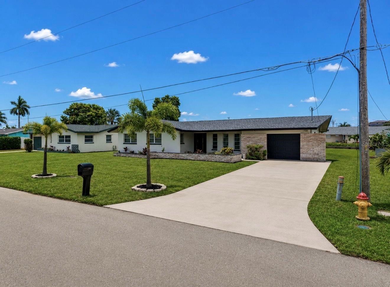 Virtually Staged. Beautifully updated 4-bedroom, 2-bath waterfront home located on a direct-access canal in the heart of Cape Coral. This property offers true Florida living with no bridges to the river, making it a perfect fit for boating enthusiasts who want quick, easy access to open water.

Inside, the home features a bright, open layout with modern updates throughout. The bedrooms are well-sized, and the home includes a 1.5-car garage—ideal for extra storage, bikes, or boating gear.

The location is one of the strongest selling points. Situated just off Cape Coral Parkway, you’re minutes from some of the area’s best restaurants, entertainment, and shopping. It’s a convenient, beautiful neighborhood that keeps you close to everything while still offering peaceful waterfront living.

A rare opportunity to rent an updated canal home in a prime Cape Coral location.