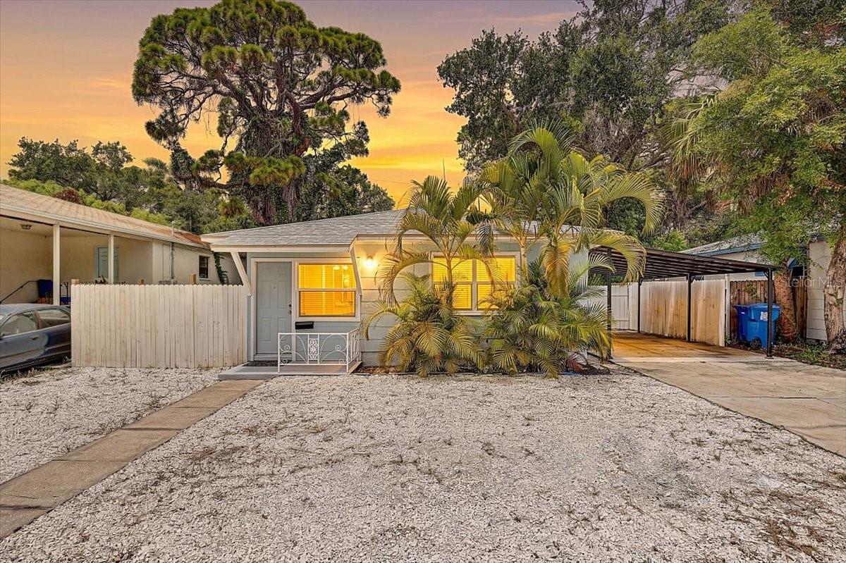Best priced 3 Bedroom 2 bathroom home in the area! This home has close to 1400 heated sqft and approximately 1800 total sqft. Along with a rare find of indoor laundry room. The carport is right of the kitchen making bringing in groceries a breeze. Stay worry-free with a Brand New roof, 2025 gas water heater, Cool AC, newer electric panel, and newer vinyl windows, new stainless appliances, new solid wood kitchen cabinets, and stone countertops. There is tile flooring throughout except in two bedroom which have new carpet. A roomie sunroom off the side and a low maintenance yard featuring turf and shell and a separated fence area out the side door which is perfect for pets and keeping them separated from the main backyard. The Washer and dryer are included for ease to the new owner! A lot of space packed with extras for the low low price of only $275,000! Walking distance to parks, Lake Maggiore, and Boyd Hill nature preserve. Right around the corner from the Prestigious Lakewood Estates, less than 20 mins from Saint Pete Beach, convenient to I-275 within 5 mins, downtown Saint Pete within 10 mins and lots of local shopping, restaurants, bars, and grocery stores. Must see to appreciate!