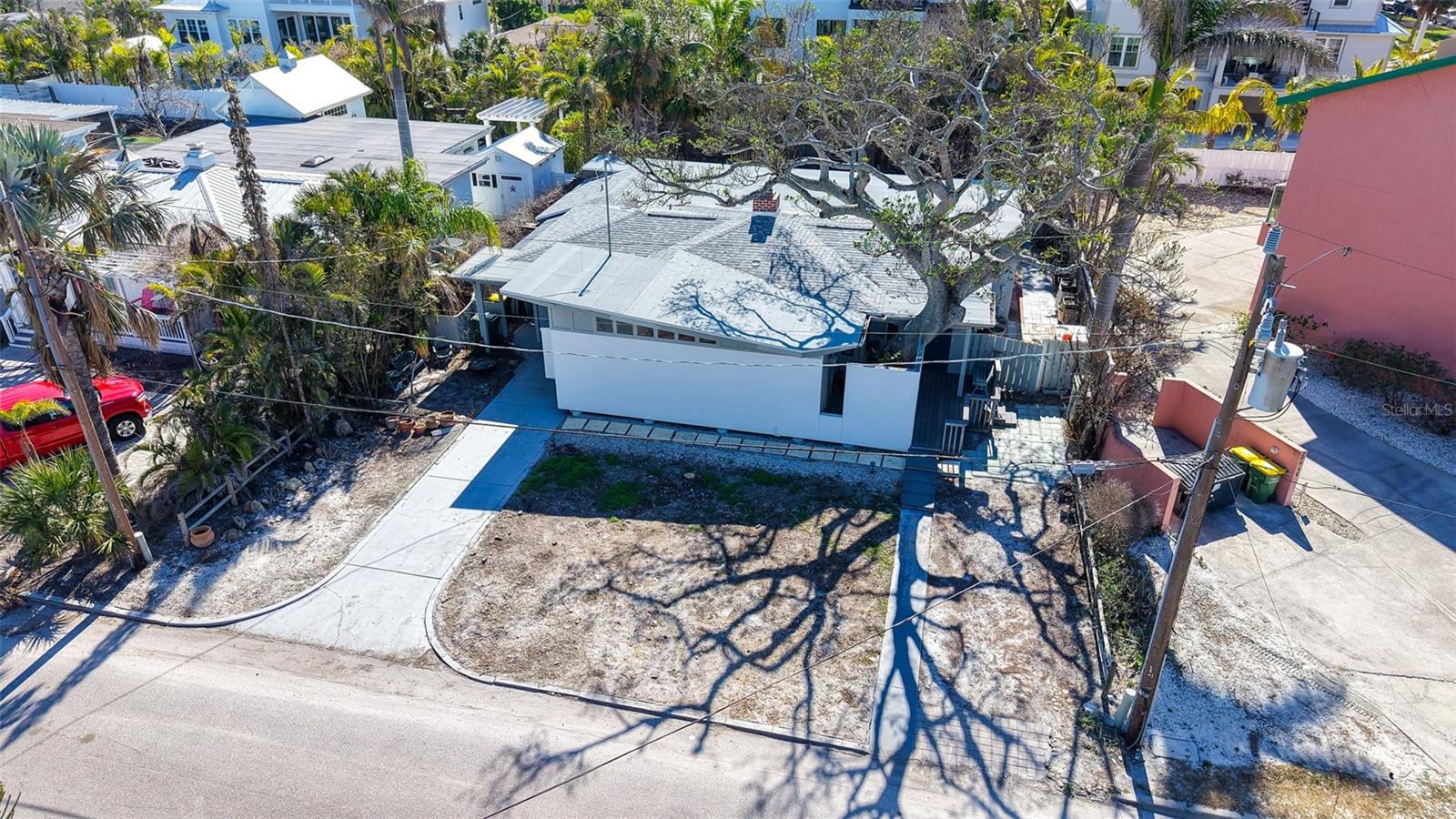 Lido Beach Land Opportunity – Just one block from Lido Beach and a short stroll to St. Armands Circle, this 8,608 sq. ft. property offers exceptional potential in one of Sarasota’s most desirable coastal enclaves. Zoned RMF3, it allows for flexible redevelopment options including single-family or multi-family use. The existing structure—a storm-damaged 3-bedroom, 2-bath home with an attached 1-bedroom apartment—offers possibilities for renovation, income potential, or complete redevelopment. While the property was impacted by Hurricane Helene, it presents a rare chance to create a custom beach retreat or investment property. Enjoy morning walks by the Gulf, stunning sunsets, and the convenience of downtown Sarasota just minutes away. Property sold as-is.