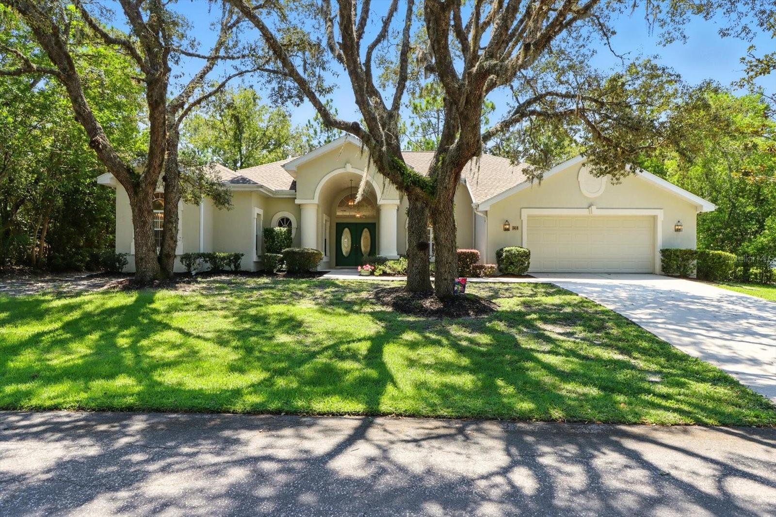 Immaculate Custom Pool Home in Sugarmill Woods – Move-In Ready! From the moment you arrive, it’s clear this beautifully maintained one-owner custom home has been lovingly cared for. Offering over 3,080 square feet of living space, this solid concrete block home features 3 bedrooms, 2.5 bathrooms, and a versatile office/den, providing plenty of room to live, work, and entertain. Set on a scenic wooded homesite with a deep greenbelt behind and a wooded DRA in front, the setting offers a peaceful natural backdrop and beautiful views. Major updates provide peace of mind, including a new roof in 2023 and a new 5-ton HVAC system installed in 2023. Inside, the spacious floor plan includes formal living and dining areas, along with a large open kitchen overlooking the family room with a gas fireplace and a charming breakfast nook. Sliding doors lead to the screened lanai and sparkling pool, creating the perfect space to enjoy Florida’s indoor-outdoor lifestyle. The split bedroom design offers comfort for everyone, while the generous primary suite provides a relaxing retreat. A convenient pool bath with exterior access makes outdoor living even easier. Additional features include a security system, in-wall pest control system, outdoor pool shower, and an oversized two-car garage. Residents also have the option to join Sugarmill Woods Country Club, featuring golf, tennis, pickleball, a driving range, fitness center, community pool, and a lively sports bar. Ideally located just minutes from the growing US-19 and Highway 98 shopping and dining corridor and about an hour from Tampa International Airport, the area is surrounded by natural springs, exceptional fishing, top-rated schools, and year-round sunshine. Come see why so many people love calling Sugarmill Woods home. 
Close