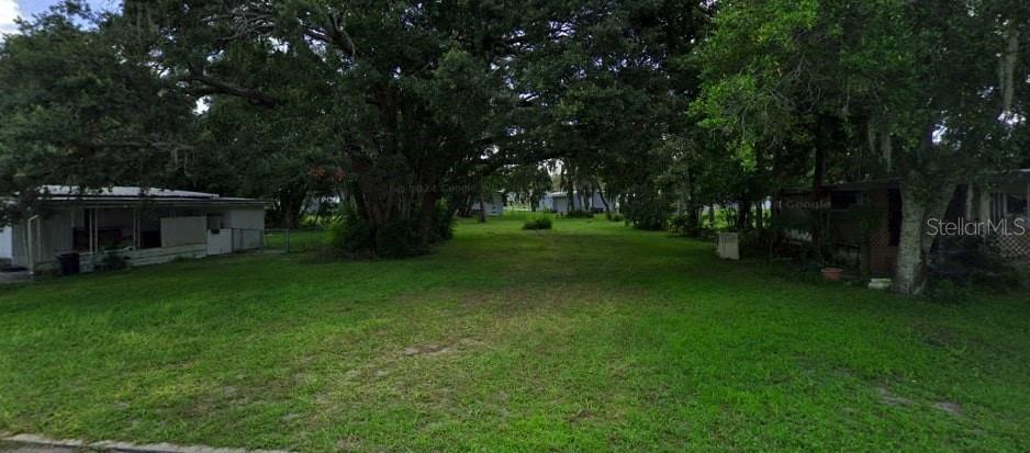 Seller Financing Available! Discover your ideal Central Florida lifestyle! This beautiful, flat, and easily buildable lot is perfectly situated in a highly desirable 55+ golf community. Imagine designing your dream manufactured home on a lot that's ready to go. The Deed Restricted Community offers incredible amenities including a golf course, heated swimming pool, and a vibrant clubhouse with endless activities. You'll never be bored! Enjoy the convenience of being centrally located on SR50, with easy access to numerous hospitals, restaurants, and shopping, plus a quick commute to both Tampa and Orlando. Don't miss this opportunity – call today!