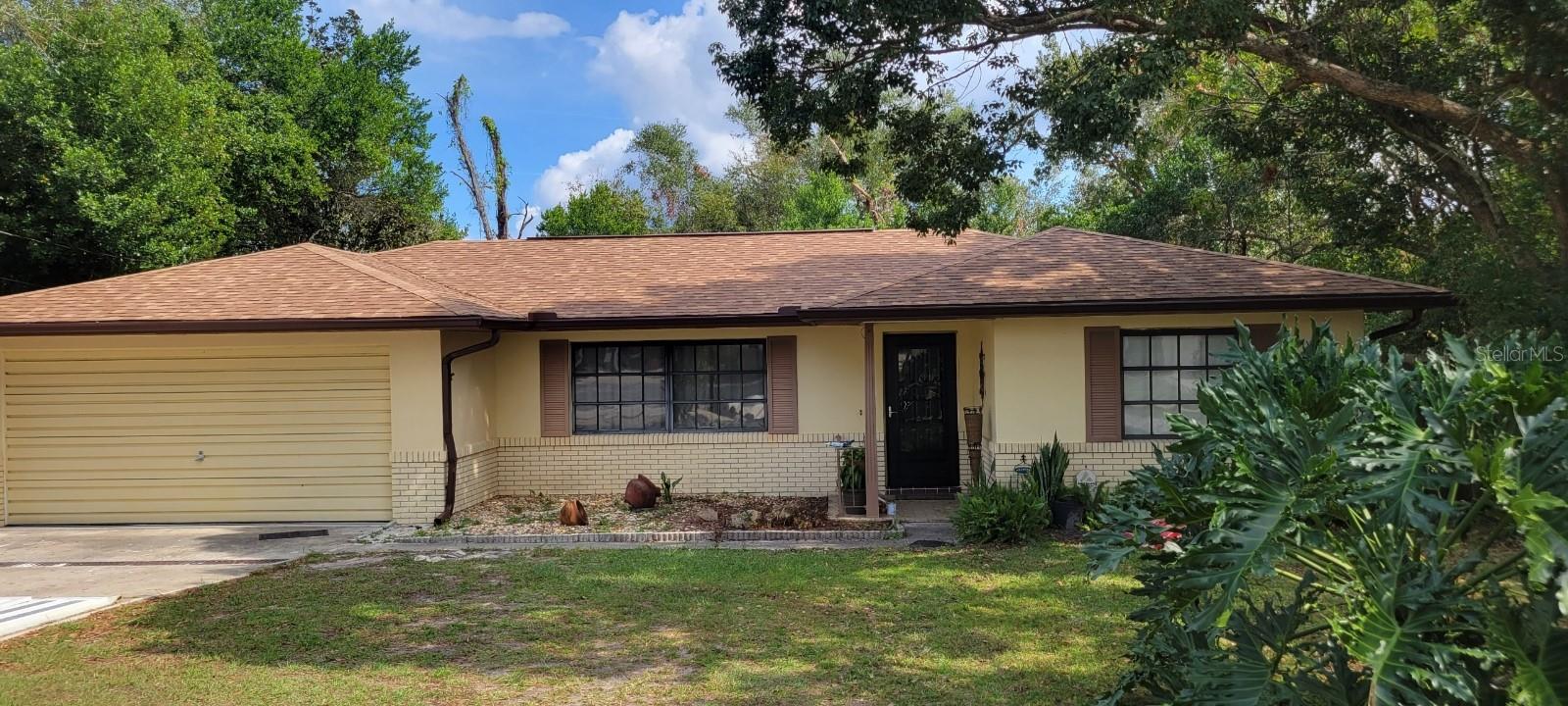 WOW ... Look at this well maintained home in one of the best locations in Deltona with a brand new roof, gutters and hot water heater!!  This 2 Bedroom / 2 Bath / 2 Car Garage home has a brand new kitchen along with all brand new stainless steel appliances!!  A nice eat-in kitchen area with a huge formal dining area.  There is also a huge family room just off kitchen with new carpet and laminate flooring installed this could be used a flex space or converted into an additional bedroom!  The living room and dining room has all brand new carpet!!  This lovely home also has a nice screen porch over looking the private fenced in back yard!  The yard is huge and plenty of room for a pool or all your toys!!  A lovely warm and inviting home looking for its new owner!!  All information is assumed to be accurate but not guaranteed. ;Water: City