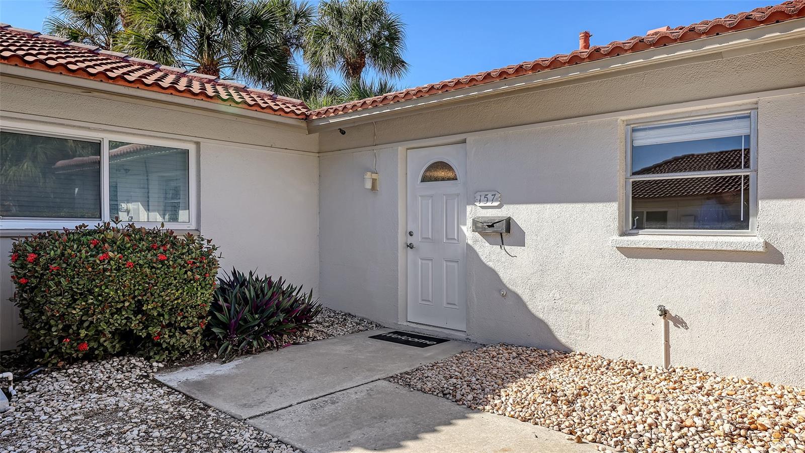 Completely renovated in 2025, this 2 bedroom/2 bath, maintenance free villa is walking distance to the powdery sands of beautiful Crescent beach on Siesta Key. Great opportunity for a second home, vacation rental or full-time residence.  2-week minimum, 26 times a year rental policy. All kitchen upgrades include new cabinets, quartz countertop, sink and all new stainless steel appliances including, microwave, refrigerator, stovetop and dishwasher.  Convenient all new washer and dryer in unit!  New tile flooring throughout.  Amenities include a renovated clubhouse with full kitchen, heated swimming pool and outdoor grilling areas.  This well-managed island retreat is located just a short distance to restaurants, shopping, entertainment and water sports.  Enjoy the stress free, beach lifestyle of Siesta Key!